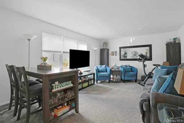 a living room with furniture and a couch