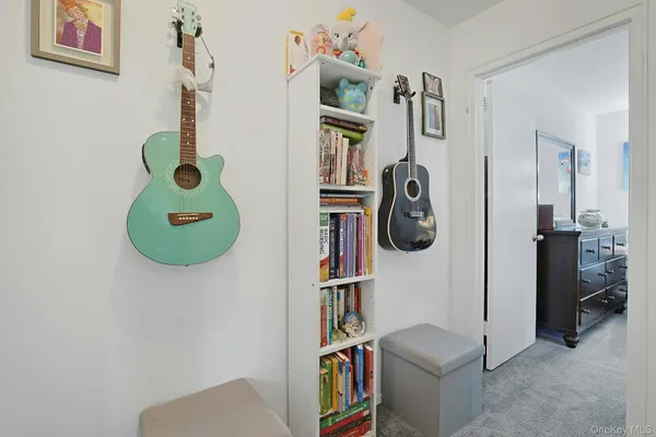 a bed room with a bed window and a table