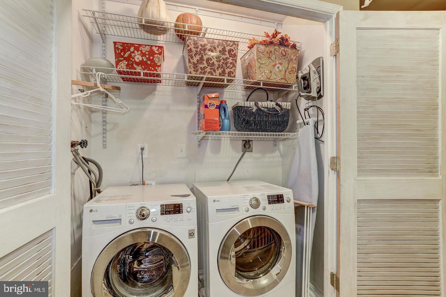 6036 Old Landing Way Burke, VA 22015 - Photo 15 of 19 a utility room with dryer and washer