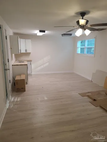 a view of a livingroom with a hardwood