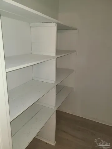 a view of an empty walk in closet