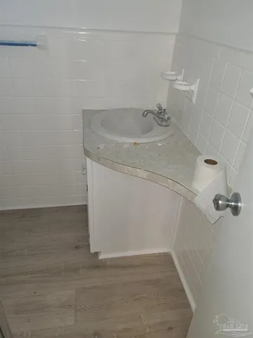 a bathroom with a sink and vanity