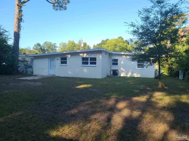 a bathroom with a sink toilet and mirror
