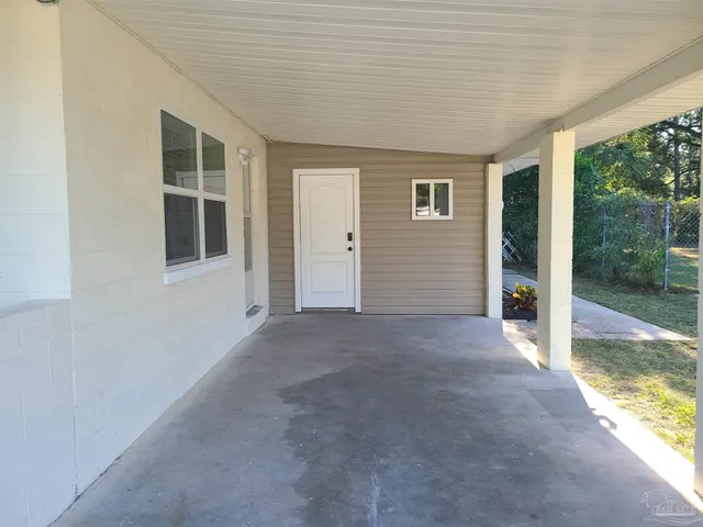 a view of a pathway with a yard