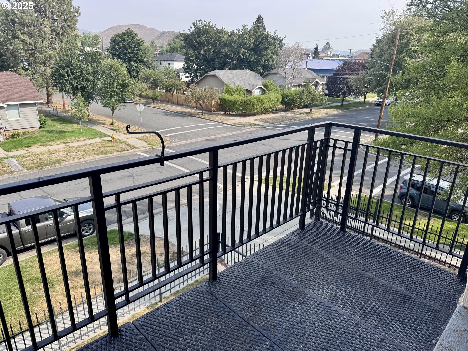 2365 4th Street Baker City, OR 97814 - Photo 13 of 27 a view of a balcony with wooden fence