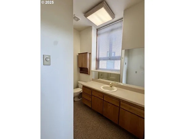 a view of a hallway with a chandelier