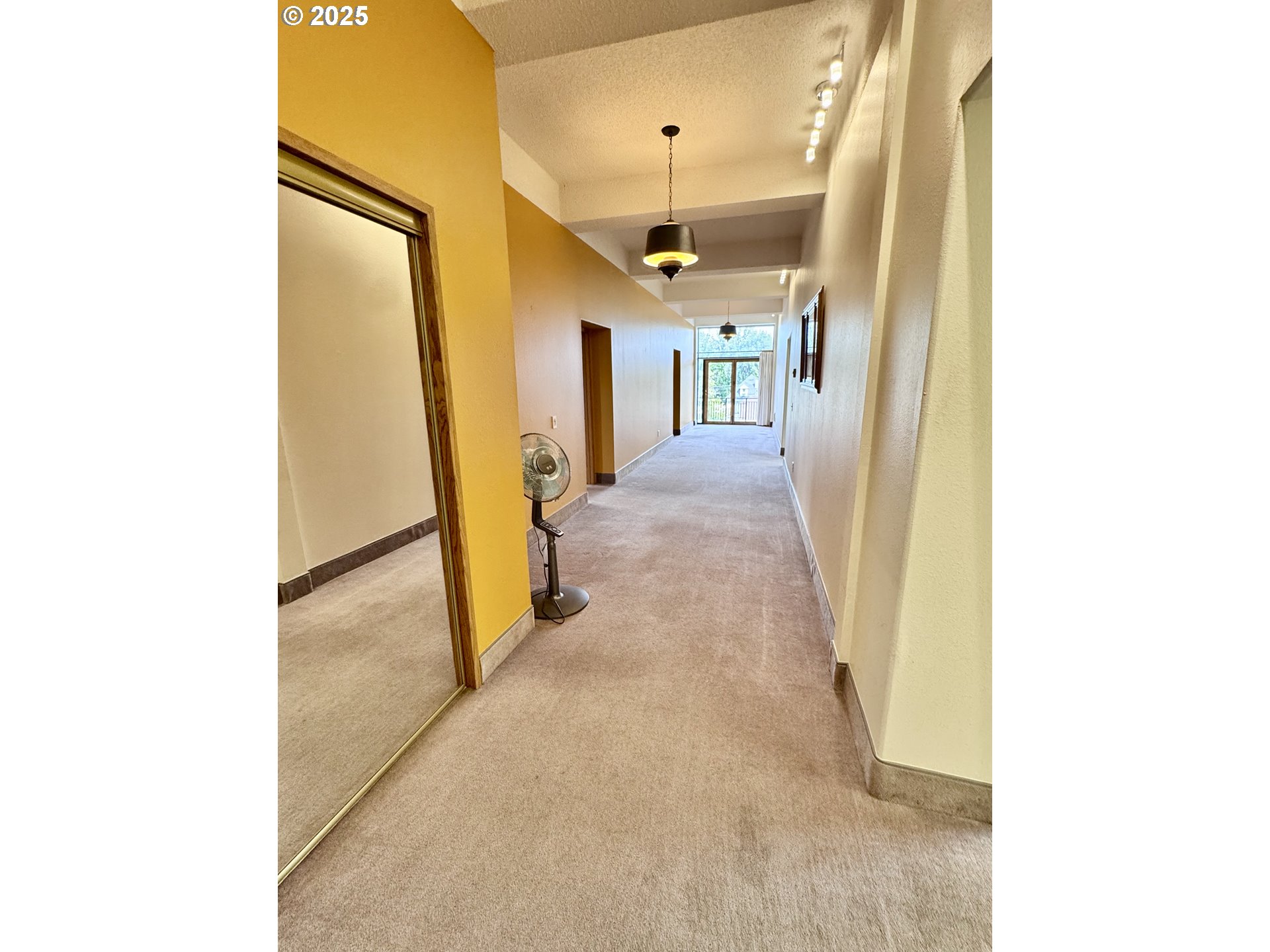 2365 4th Street Baker City, OR 97814 - Photo 19 of 27 a view of a hallway with wooden floor
