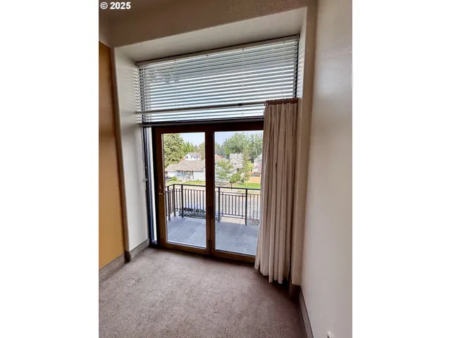 a view of a building with a street