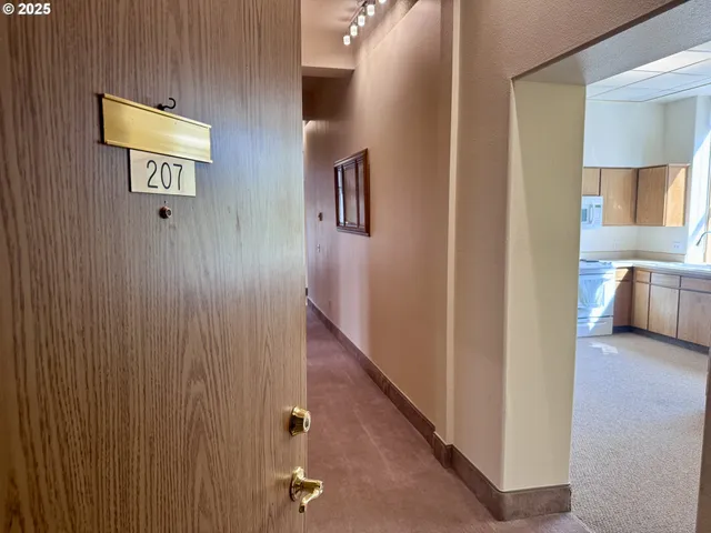 a view of a hallway with entryway