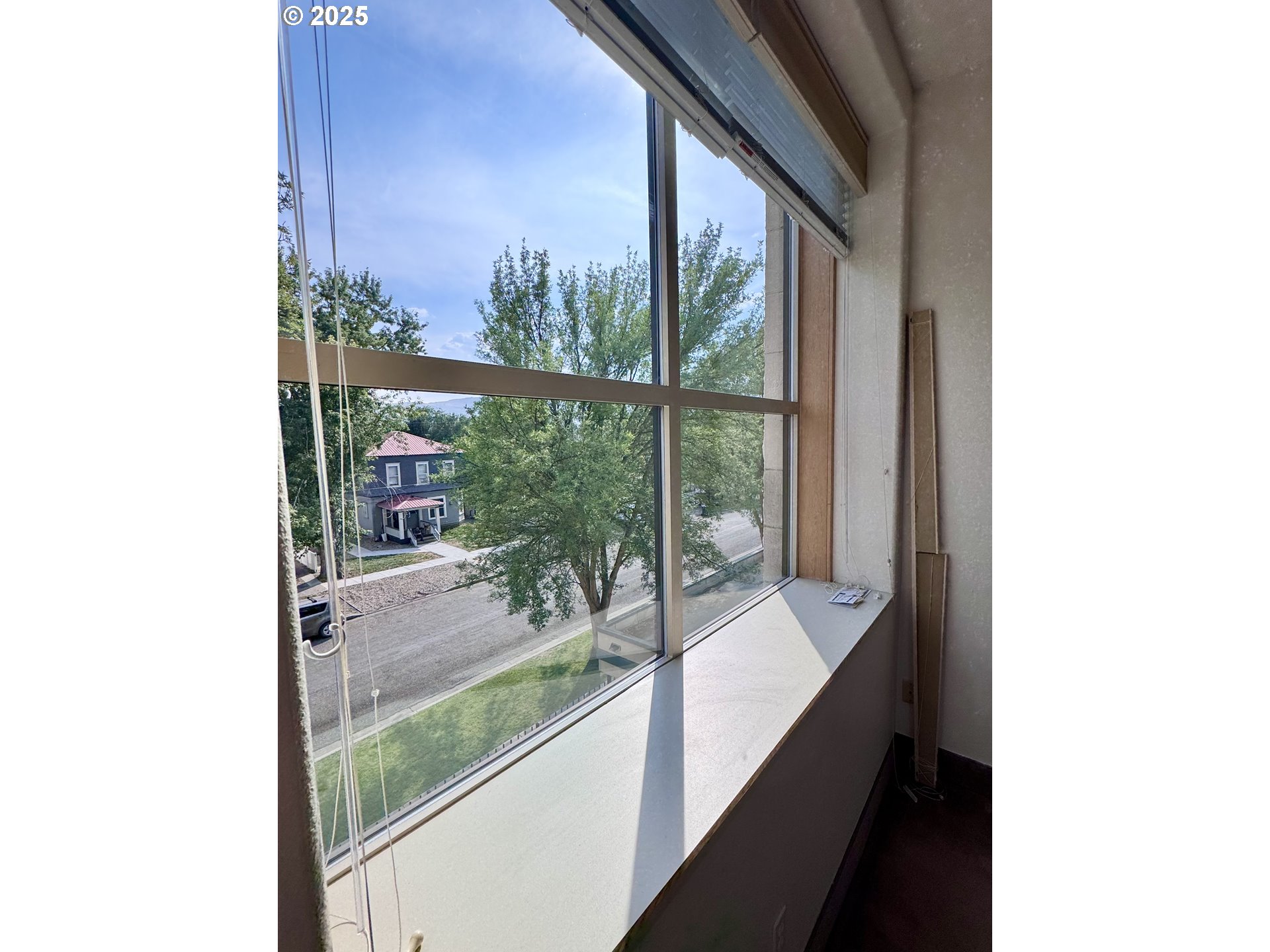 2365 4th Street Baker City, OR 97814 - Photo 21 of 27 a view of a room with a large window and wooden floor