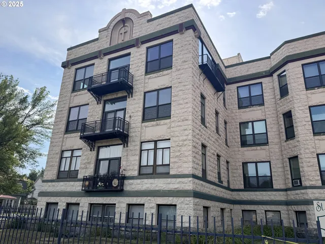 a bathroom with a sink and a shower