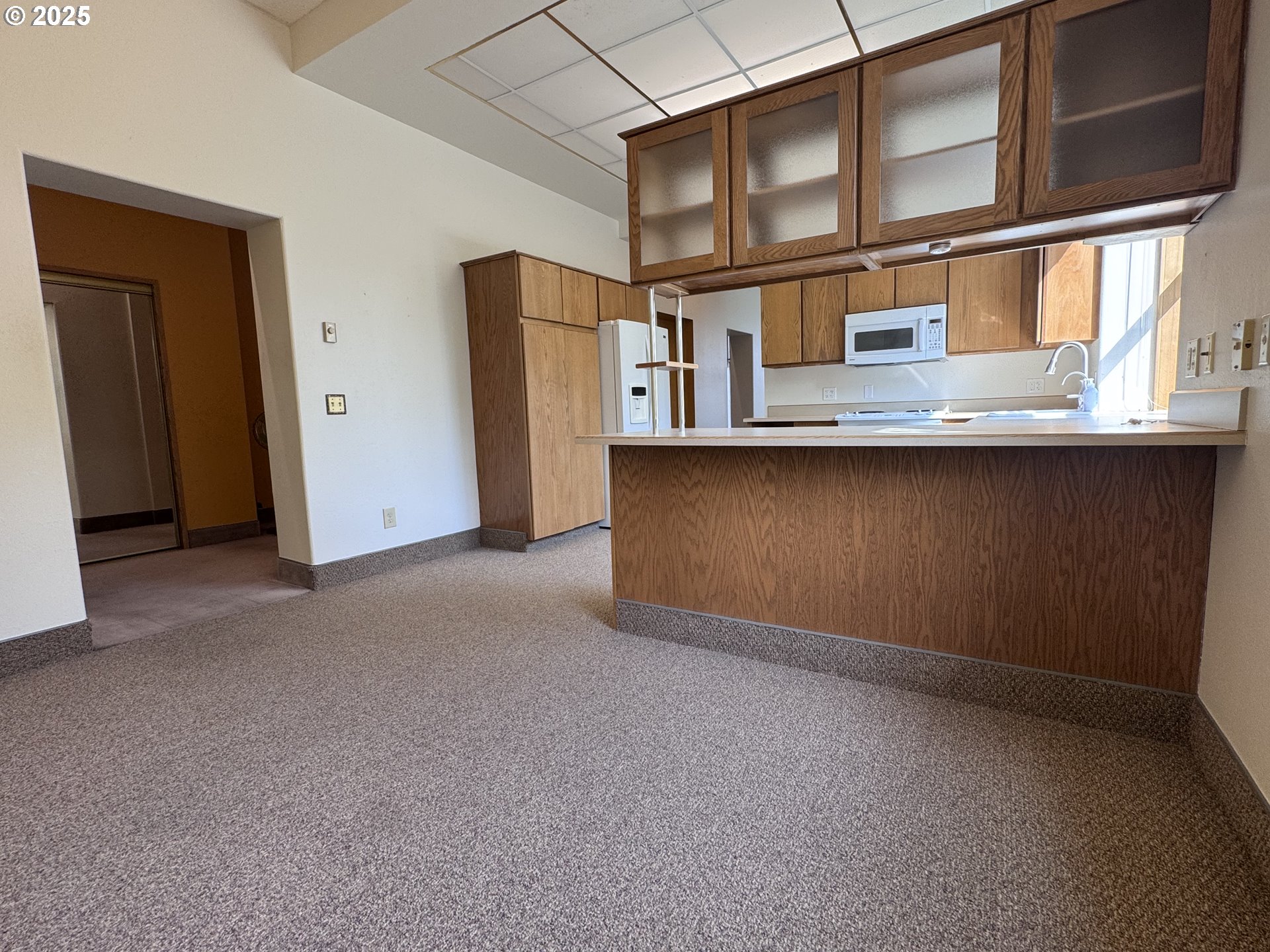 2365 4th Street Baker City, OR 97814 - Photo 5 of 27 a view of an empty room with a cabinet