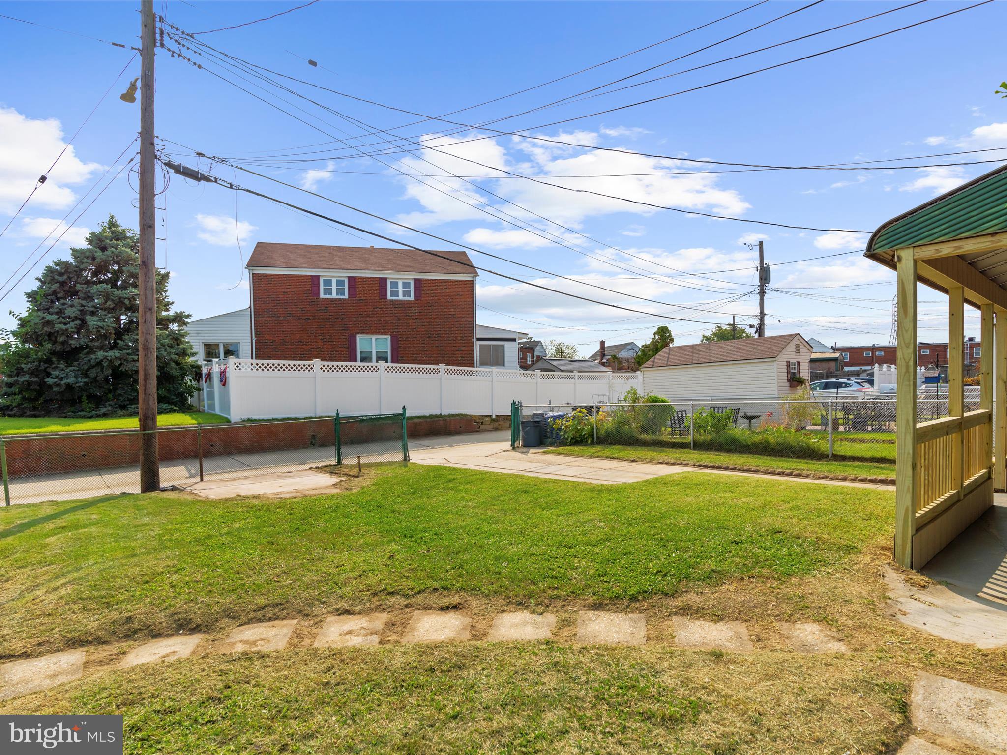 7821 Rockbourne Road Baltimore, MD 21222 - Photo 33 of 56 a view of a swimming pool with an outdoor space and seating area