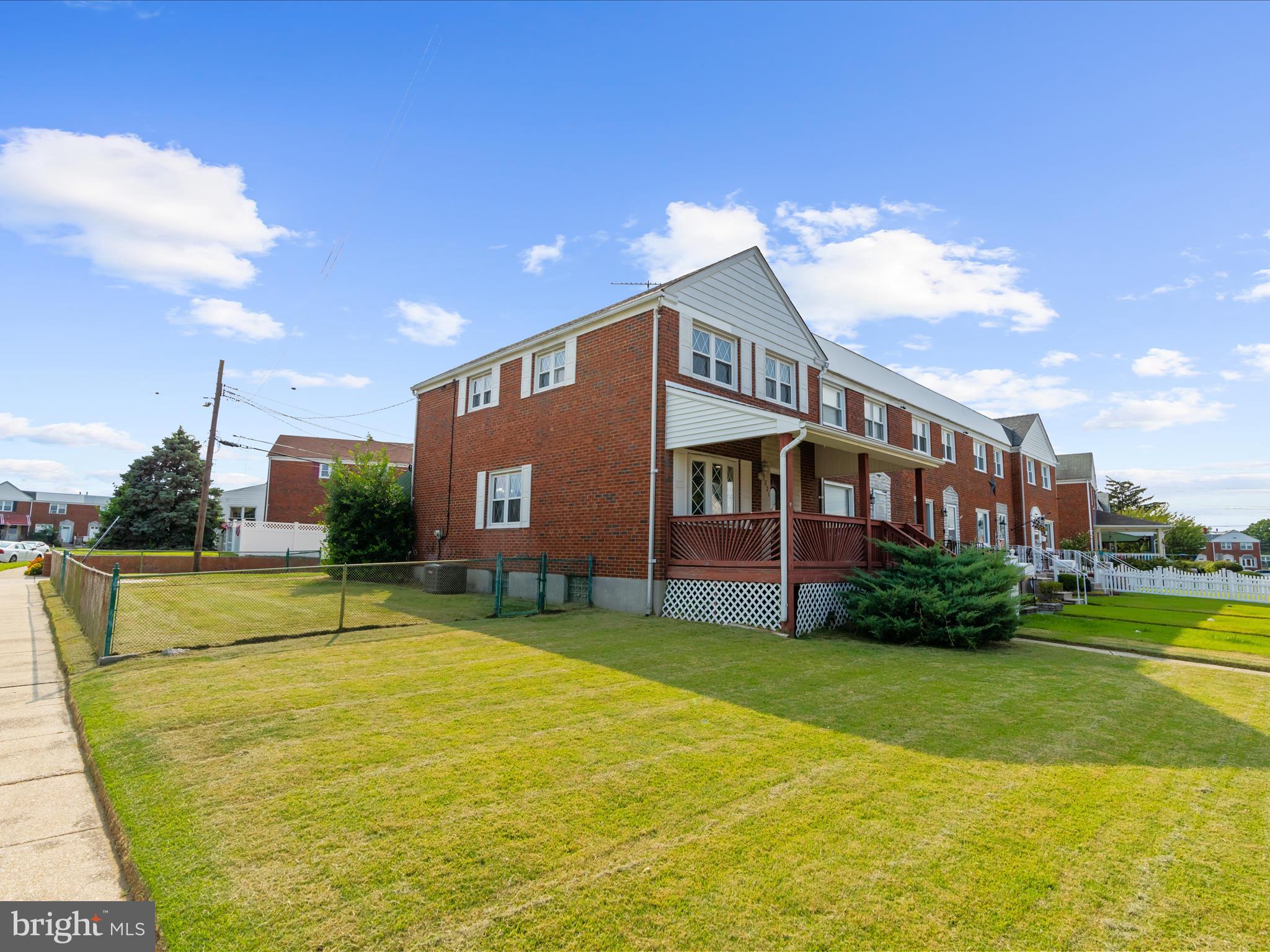 7821 Rockbourne Road Baltimore, MD 21222 - Photo 36 of 56 a front view of building with outdoor space and swimming pool