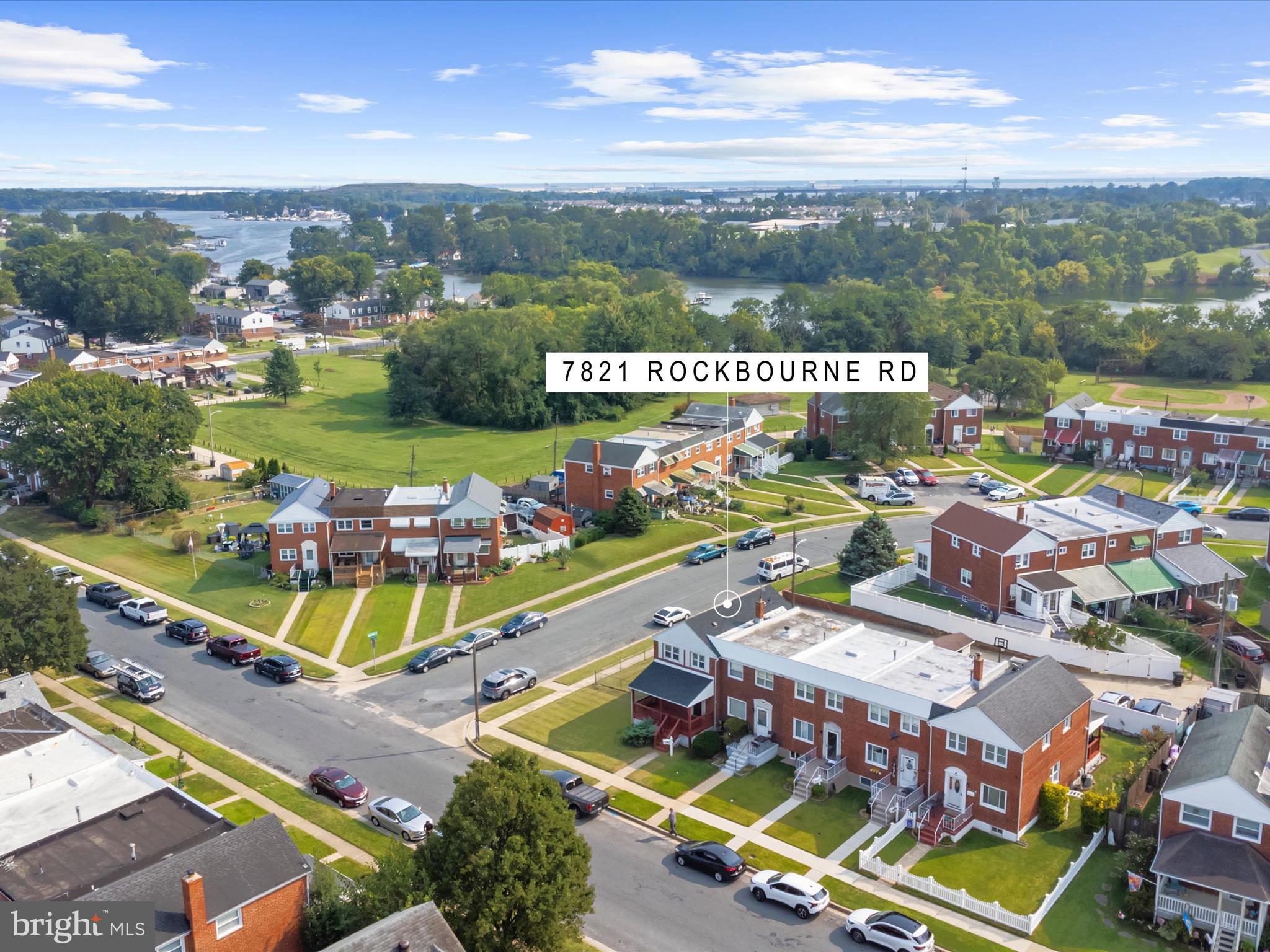7821 Rockbourne Road Baltimore, MD 21222 - Photo 48 of 56 an aerial view of a resort with swimming pool and outdoor seating