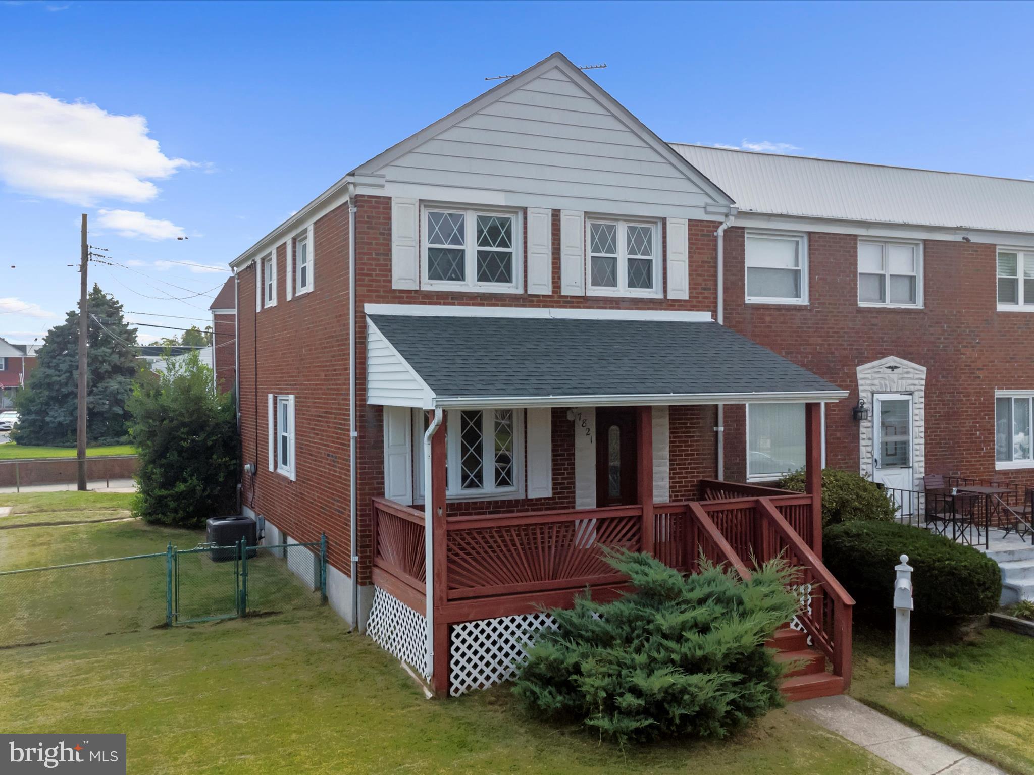 7821 Rockbourne Road Baltimore, MD 21222 - Photo 49 of 56 a front view of a house with a yard