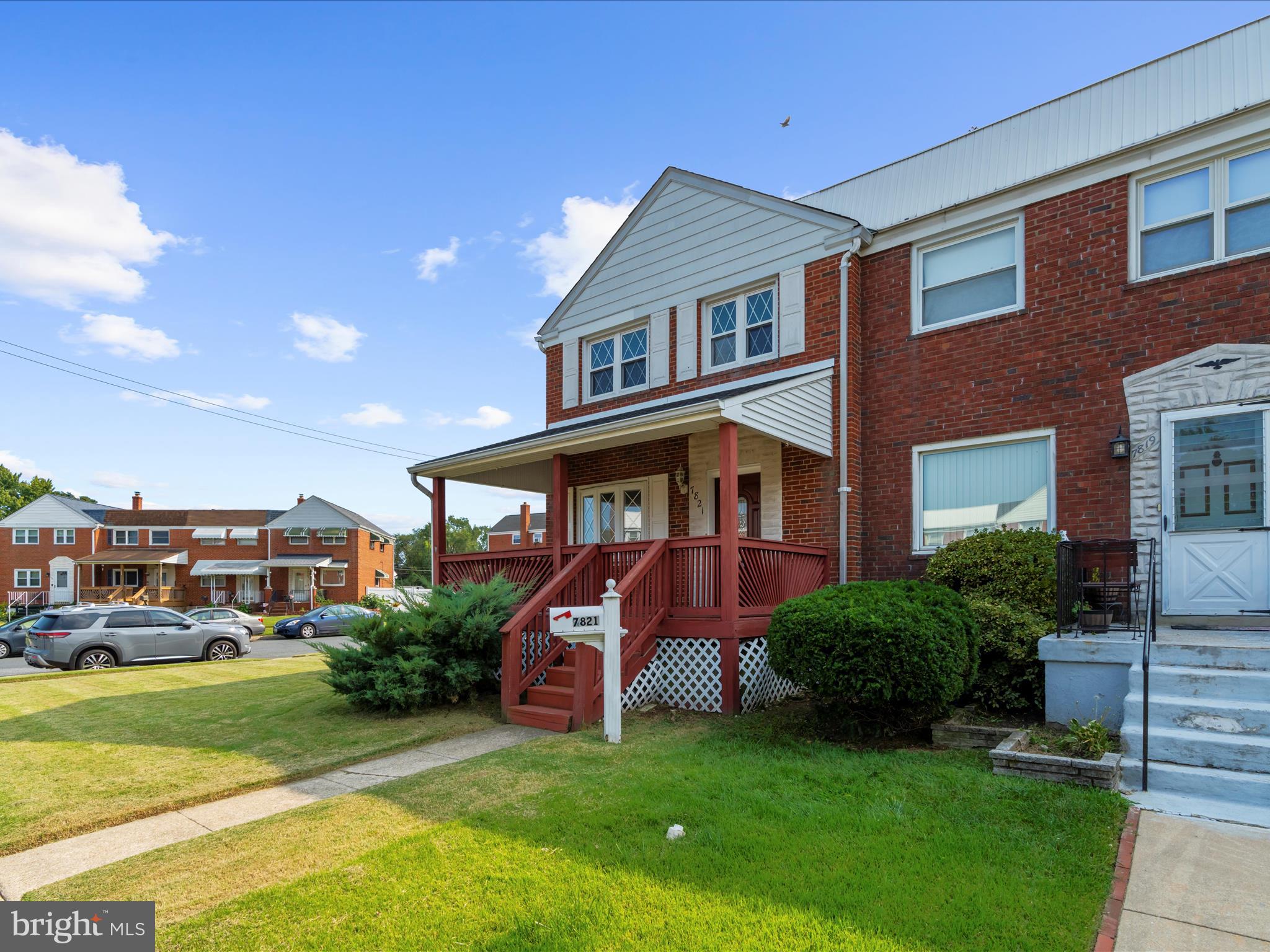 7821 Rockbourne Road Baltimore, MD 21222 - Photo 56 of 56 a front view of a house with garden