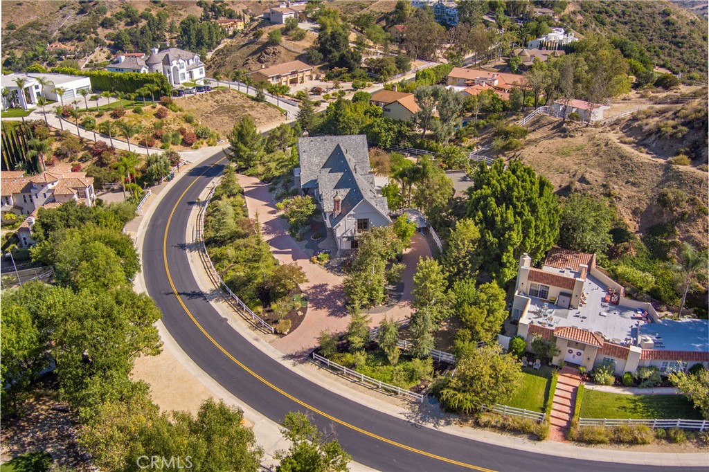 85 Saddlebow Road Bell Canyon, CA 91307 - Photo 75 of 75 an aerial view of residential houses with outdoor space and trees