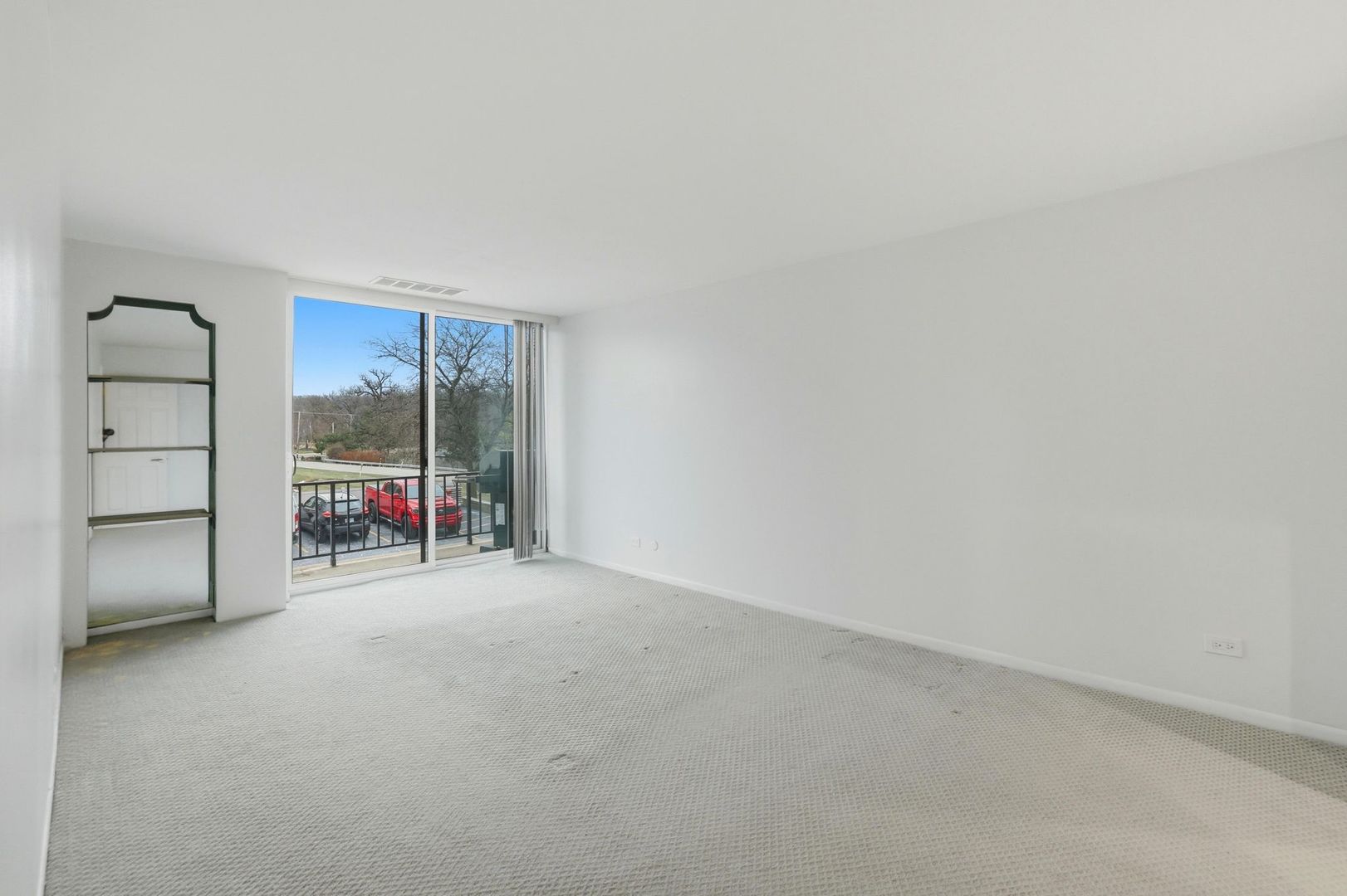 190 South Wood Dale Road, Unit 200 Wood Dale, IL 60191 - Photo 19 of 34 a view of a room with an empty space and window