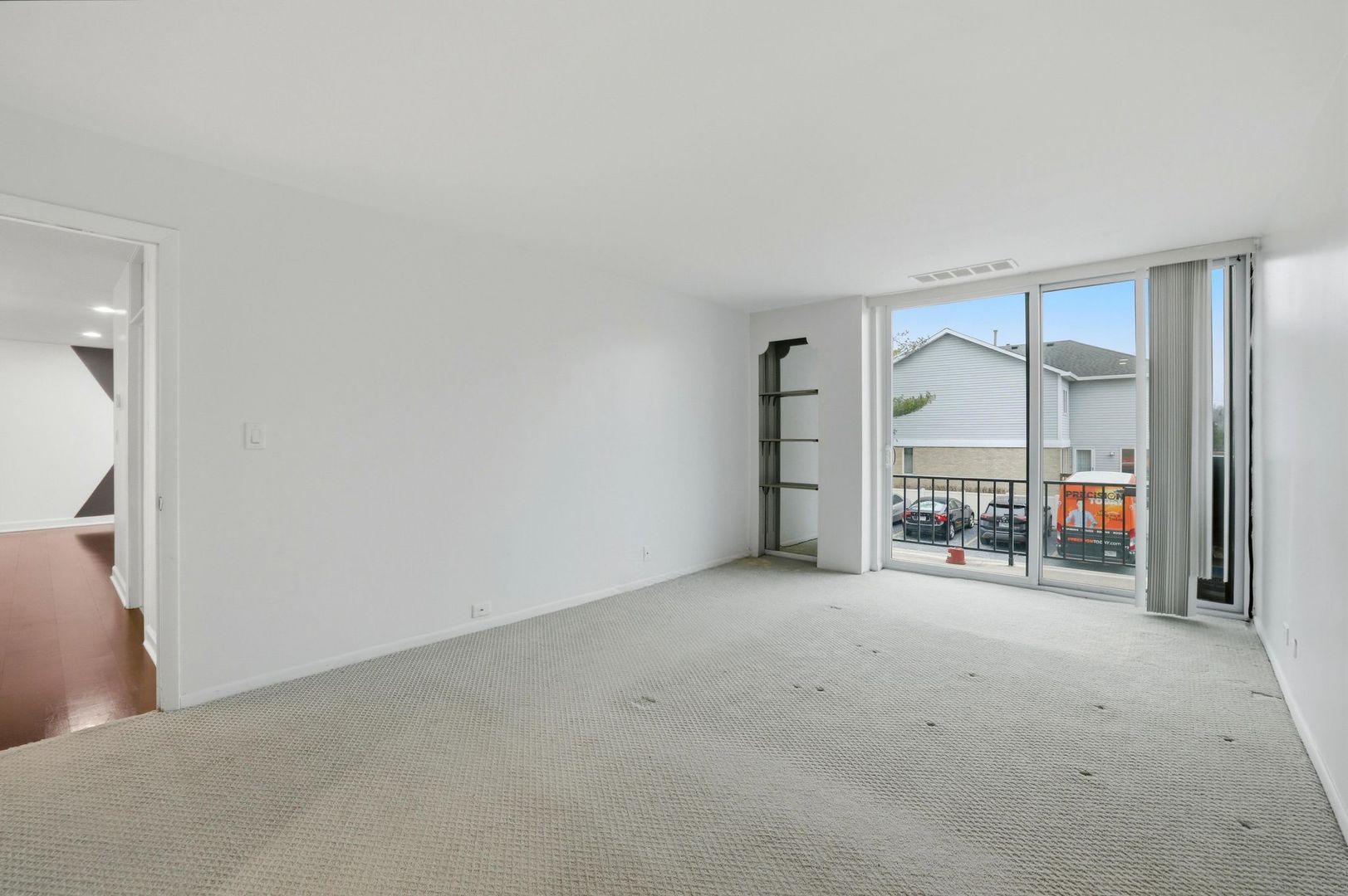 190 South Wood Dale Road, Unit 200 Wood Dale, IL 60191 - Photo 21 of 34 an empty room with furniture and a ceiling fan