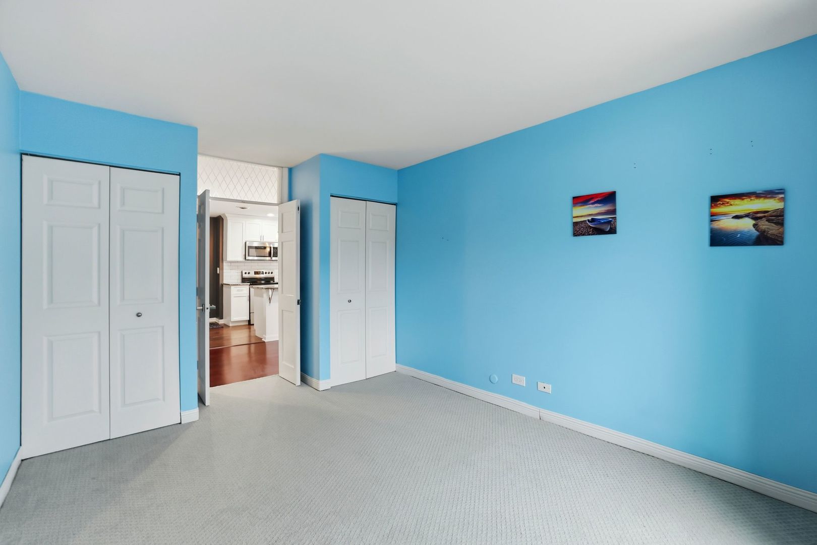 190 South Wood Dale Road, Unit 200 Wood Dale, IL 60191 - Photo 25 of 34 an empty room with closet and a window