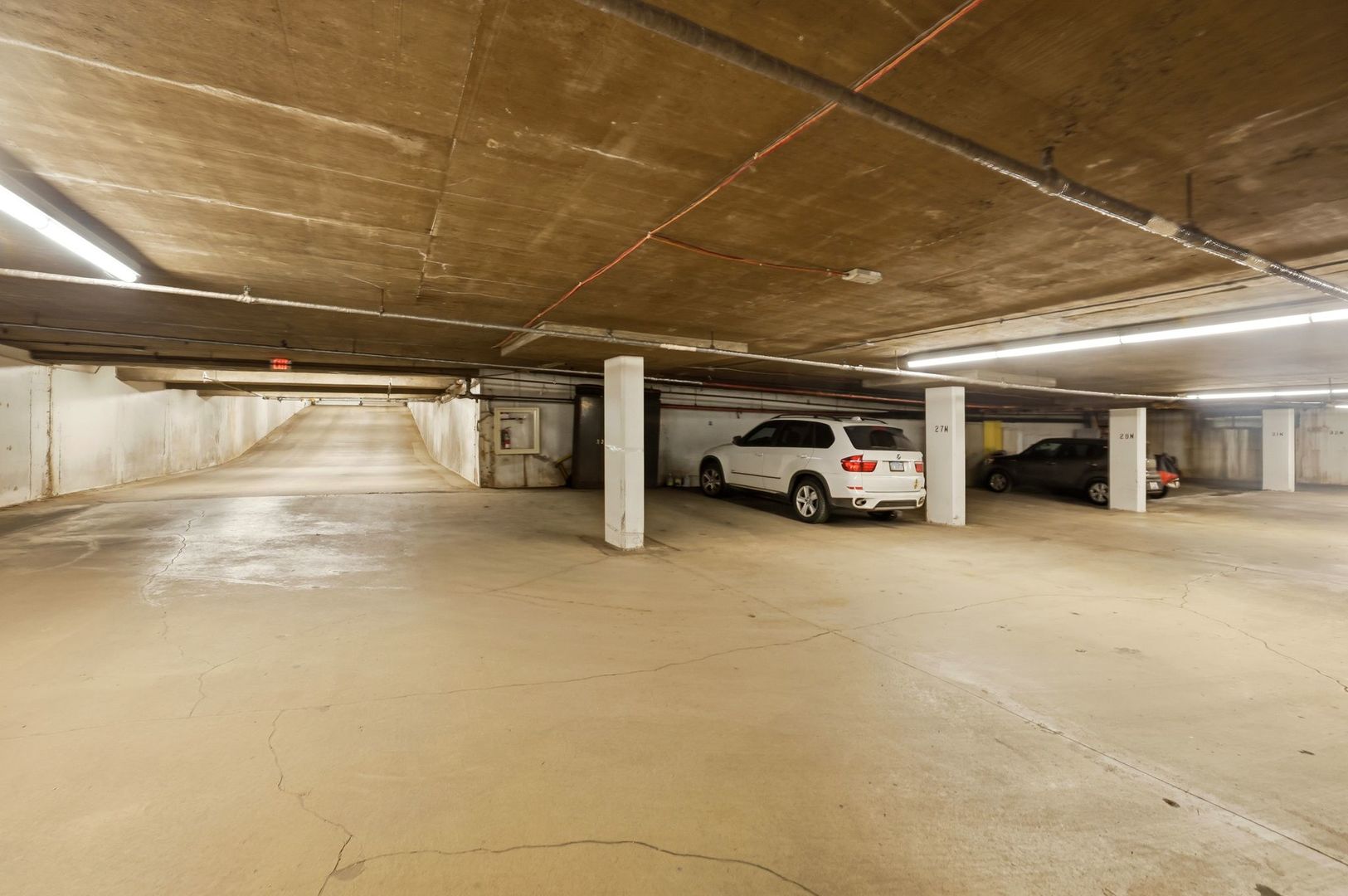 190 South Wood Dale Road, Unit 200 Wood Dale, IL 60191 - Photo 33 of 34 a car parked in parking garage