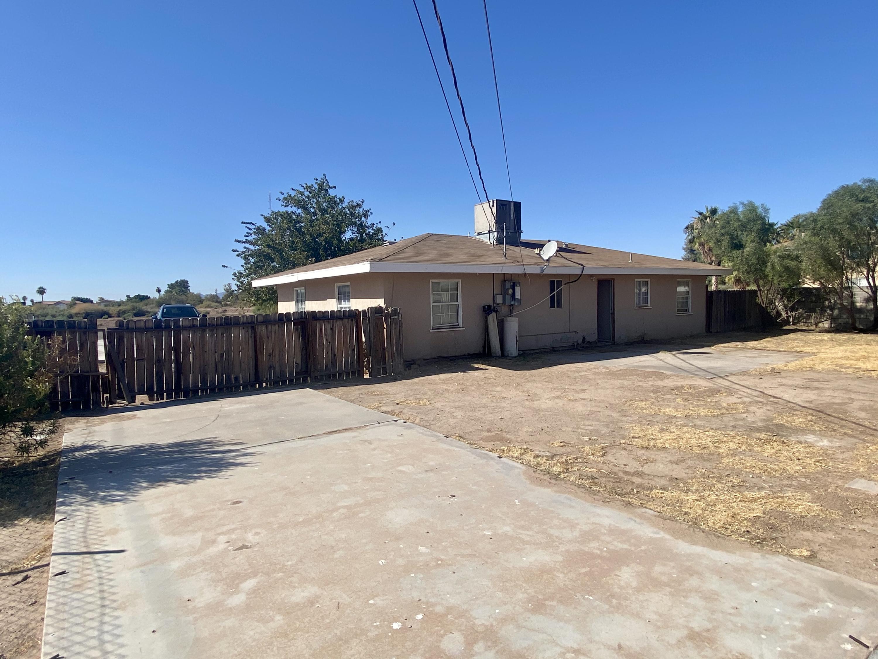 660 North 6th Street Blythe, CA 92225 - Photo 13 of 13 a front view of a house with a yard