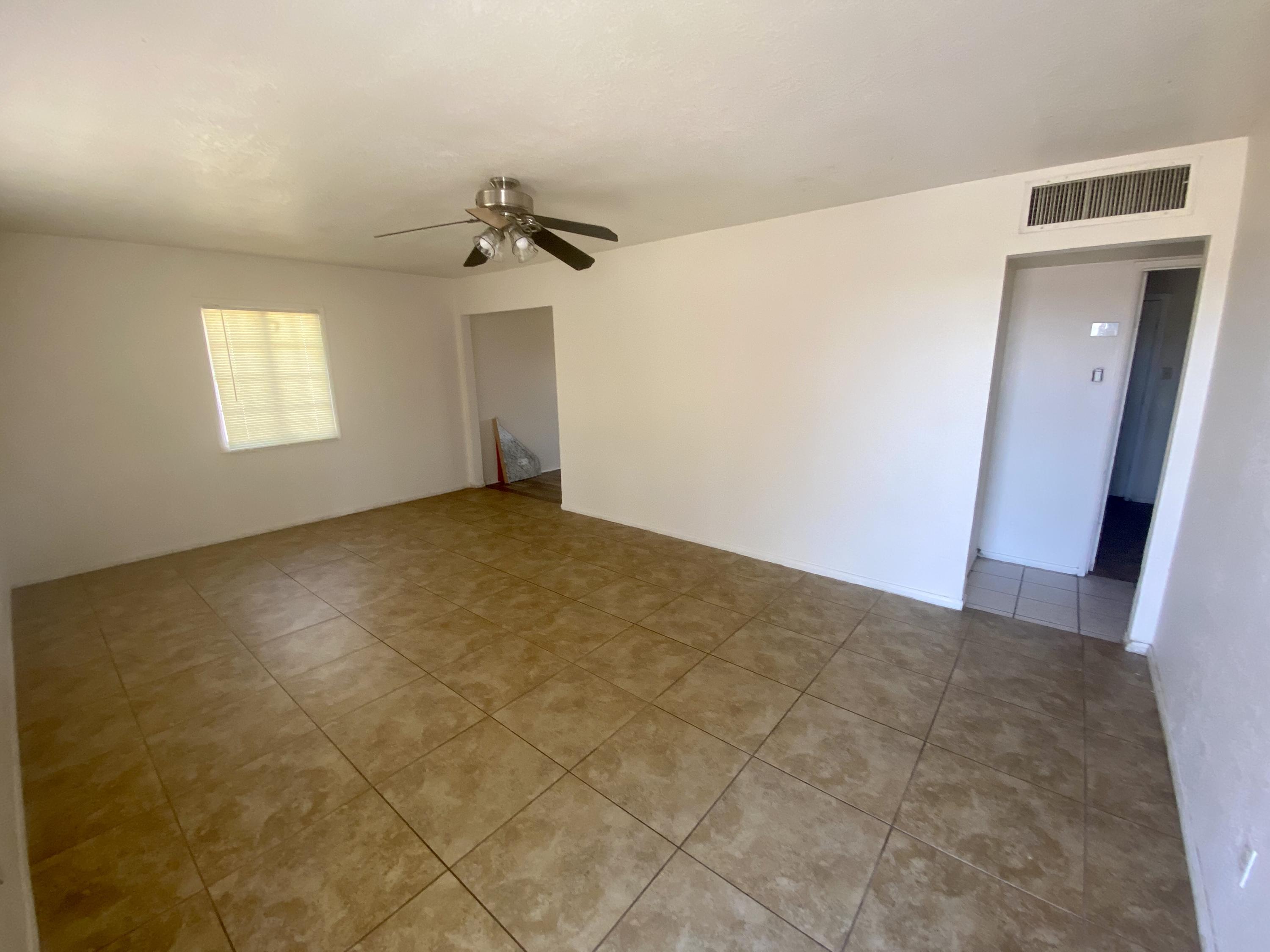 660 North 6th Street Blythe, CA 92225 - Photo 5 of 13 a view of a big room with windows and cabinet