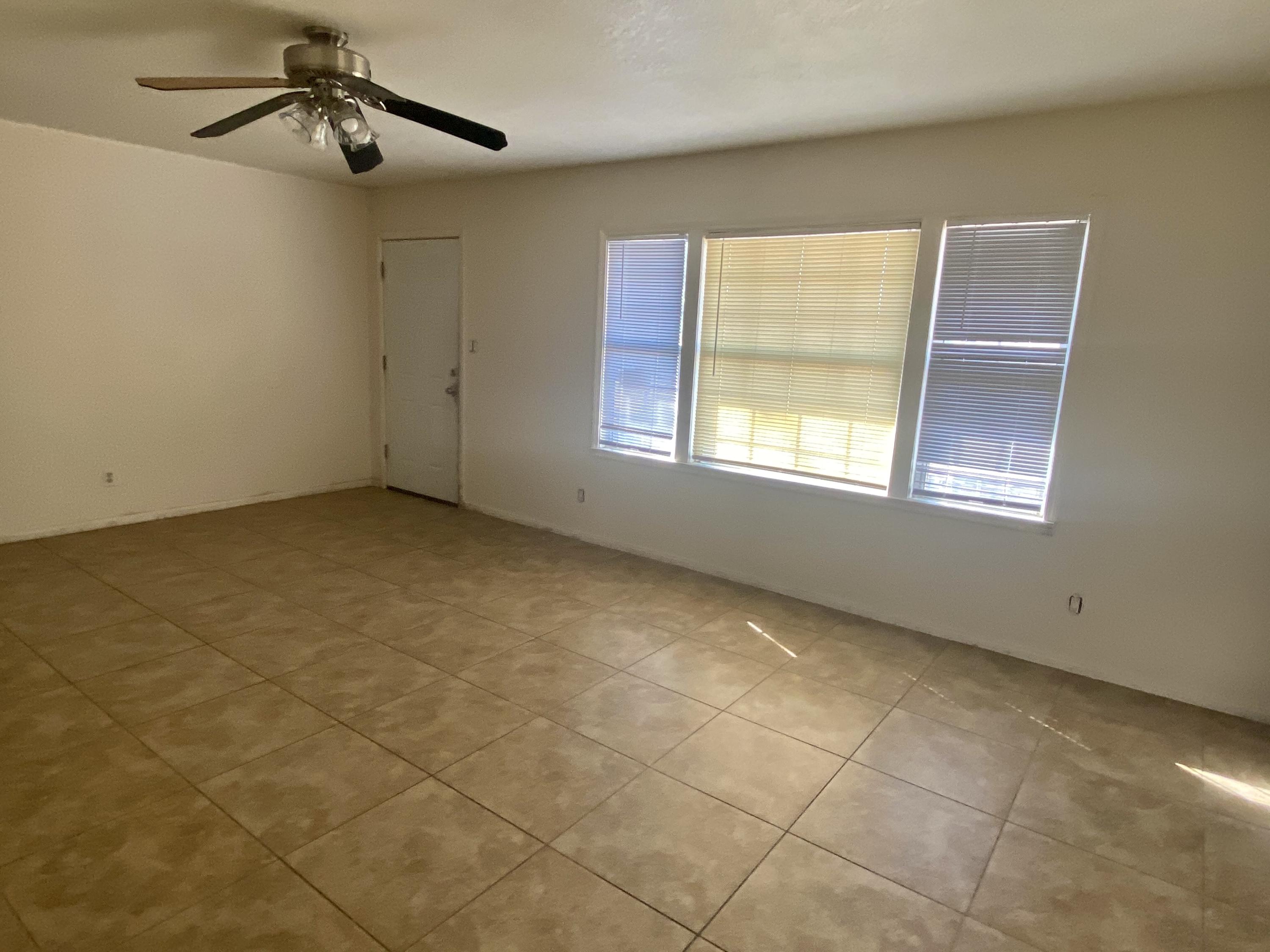 660 North 6th Street Blythe, CA 92225 - Photo 6 of 13 a view of an empty room with a window