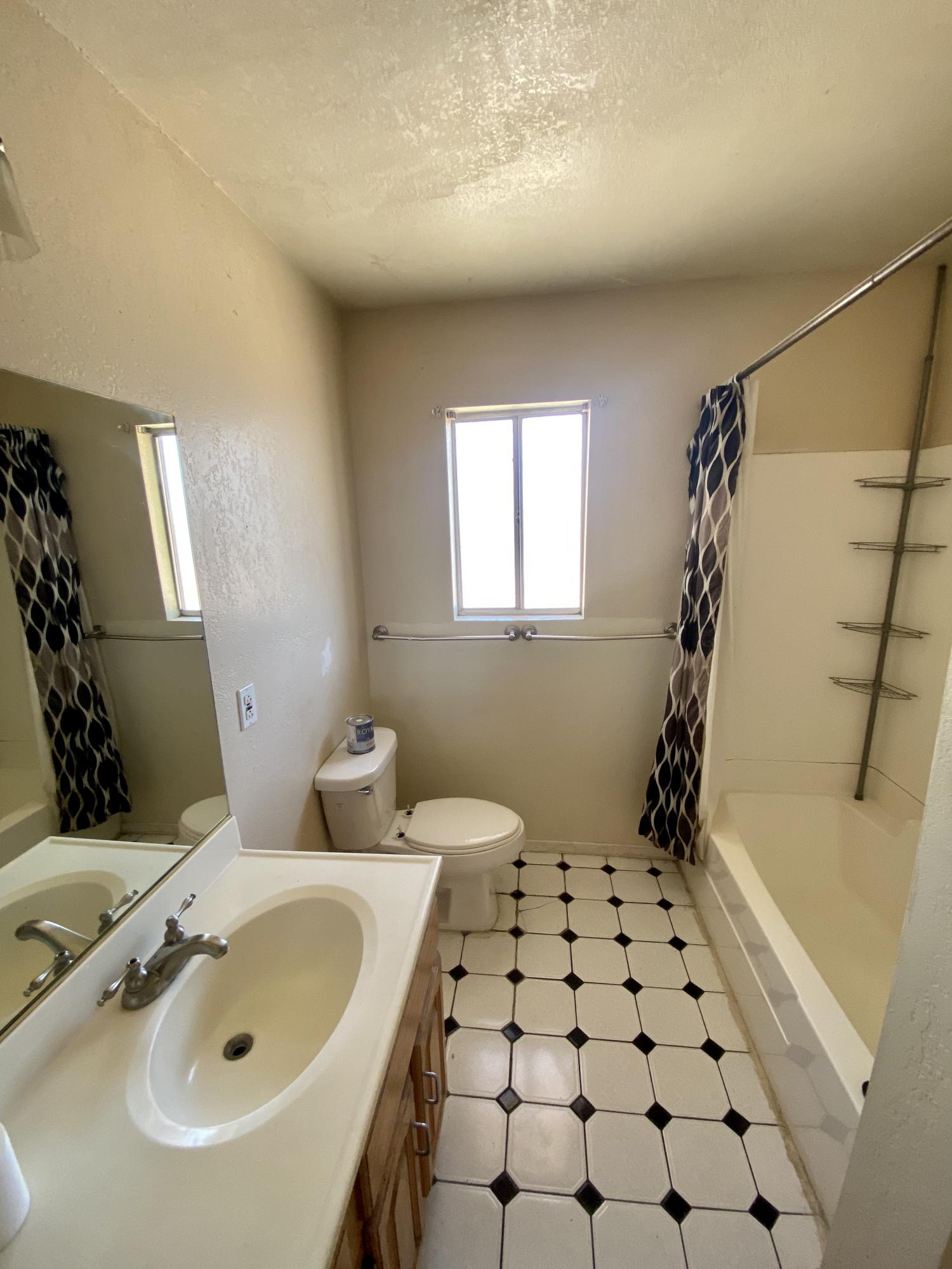 660 North 6th Street Blythe, CA 92225 - Photo 8 of 13 a bathroom with a sink and a tub