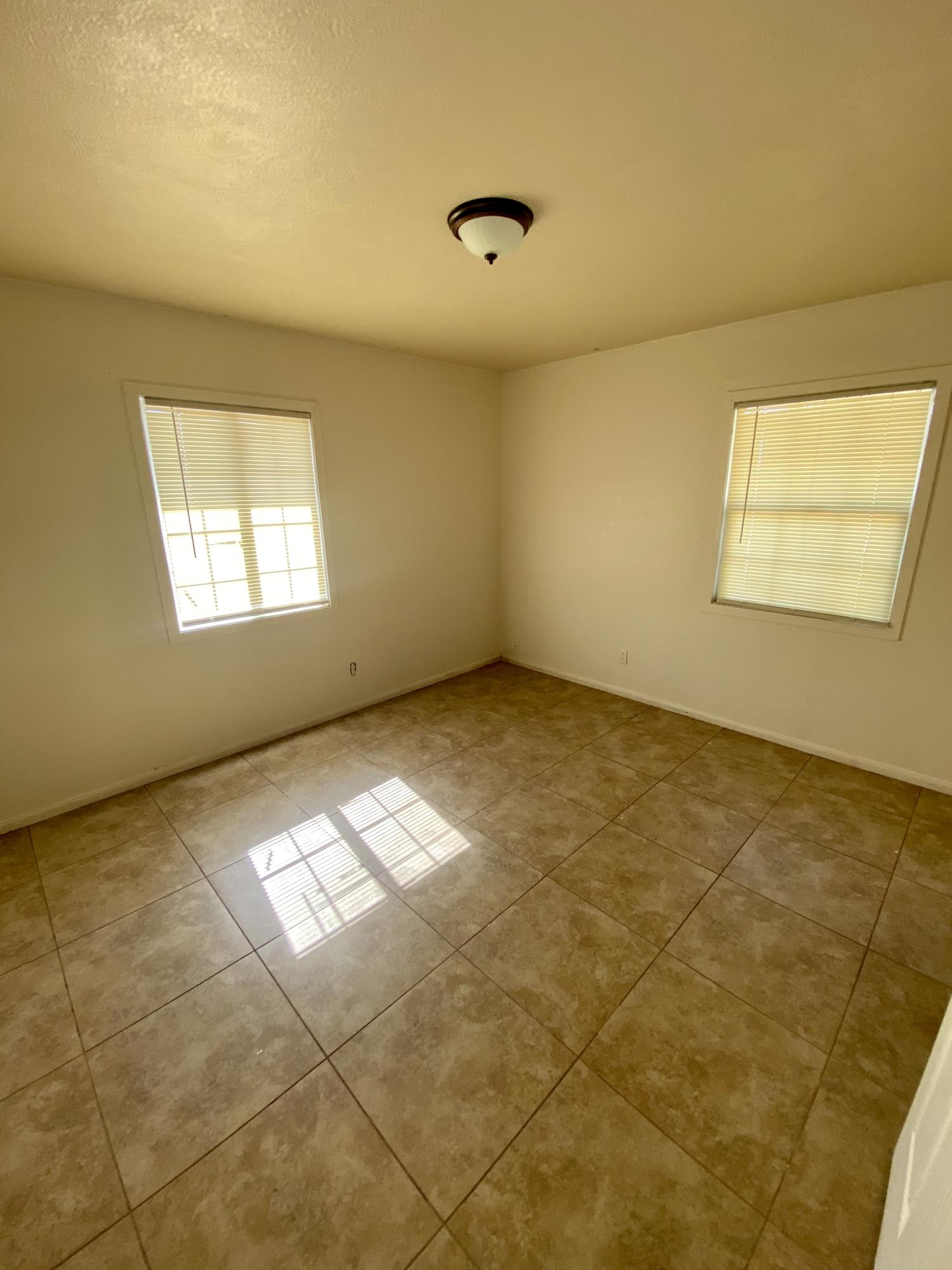 660 North 6th Street Blythe, CA 92225 - Photo 10 of 13 a view of an empty room and window