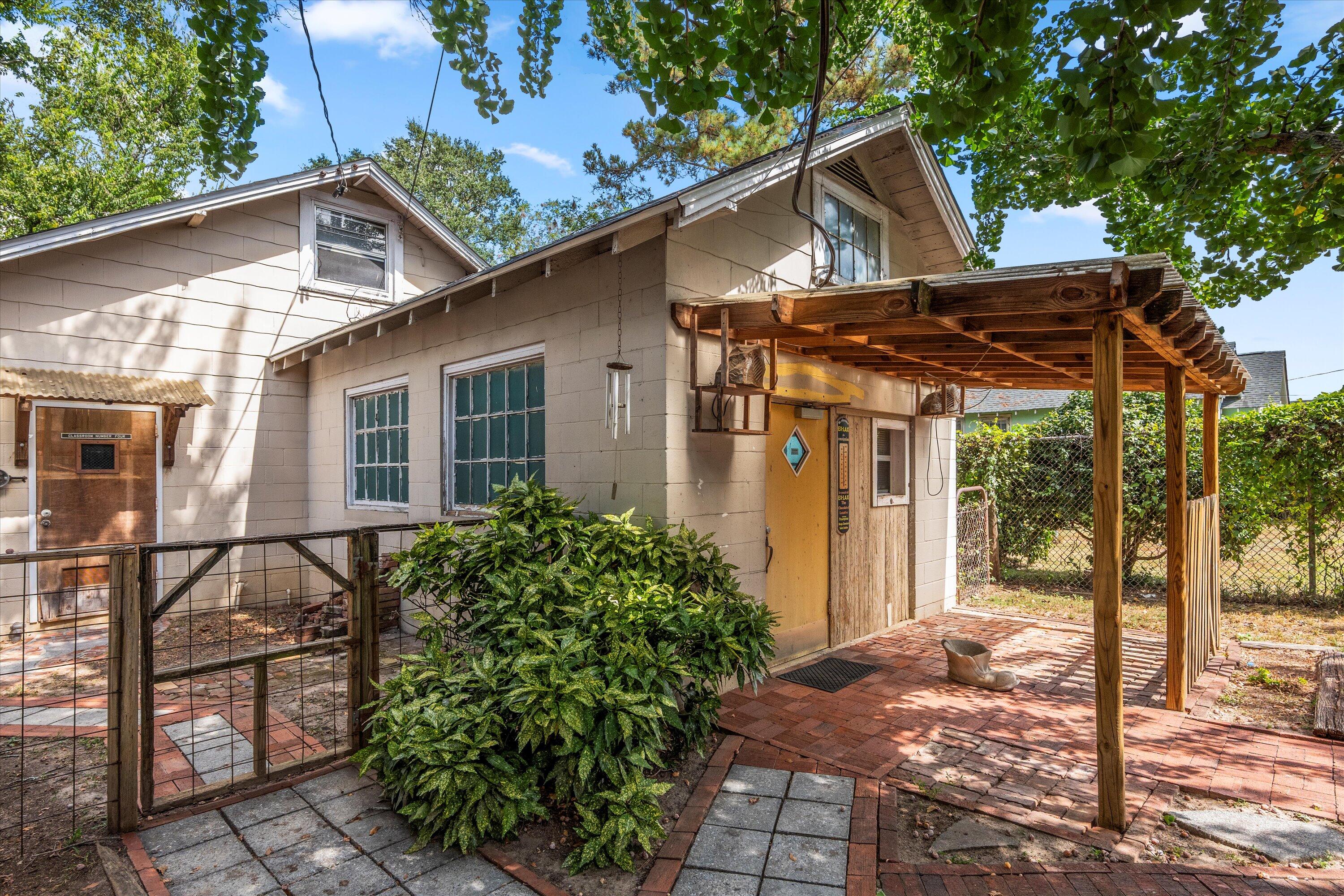 250 Milledge Road Augusta, GA 30904 - Photo 3 of 44 Entrance to workshop from side street with separate driveway.