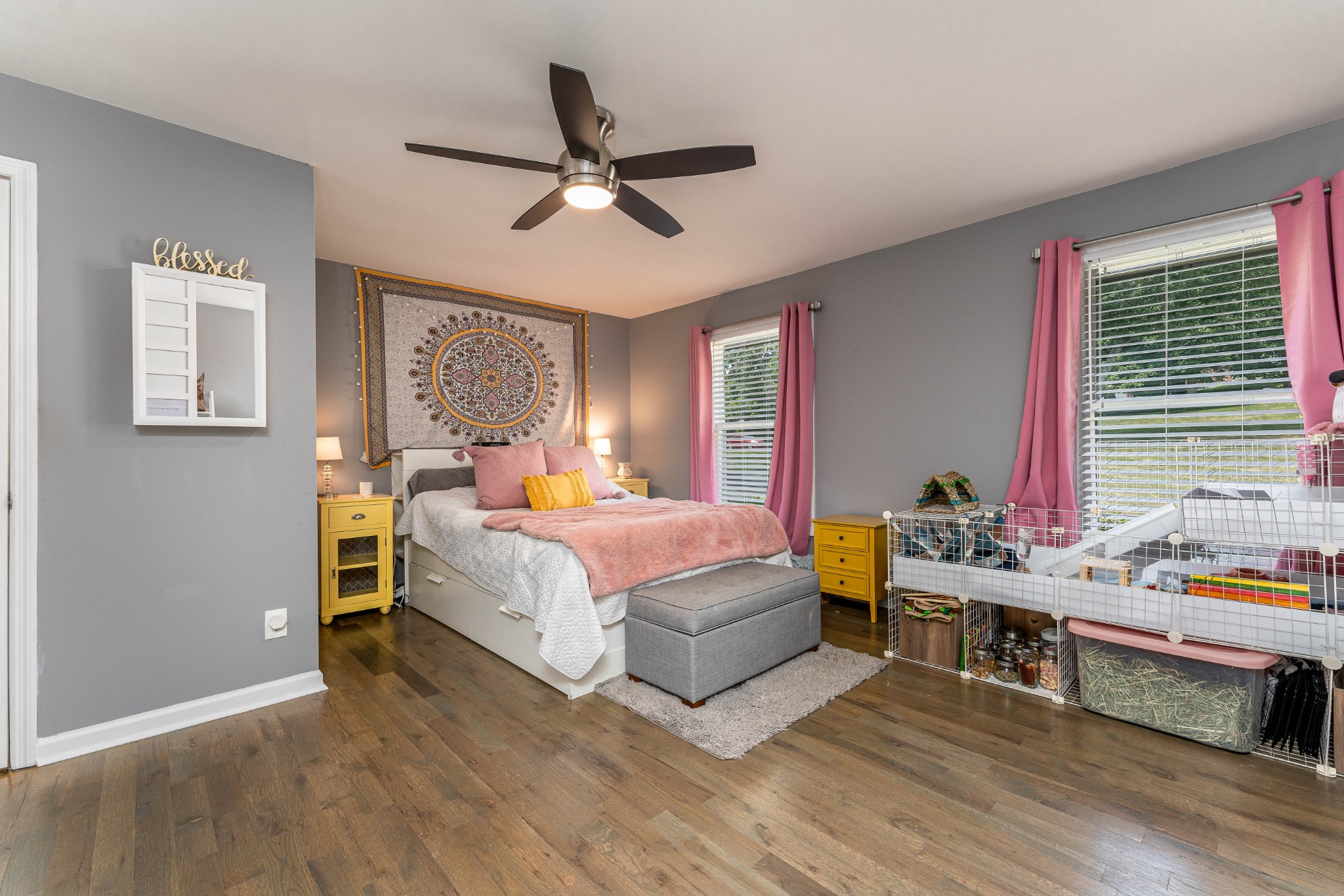 710 High Point Ridge Road Franklin, TN 37069 - Photo 14 of 32 a bedroom with a bed and a chandelier