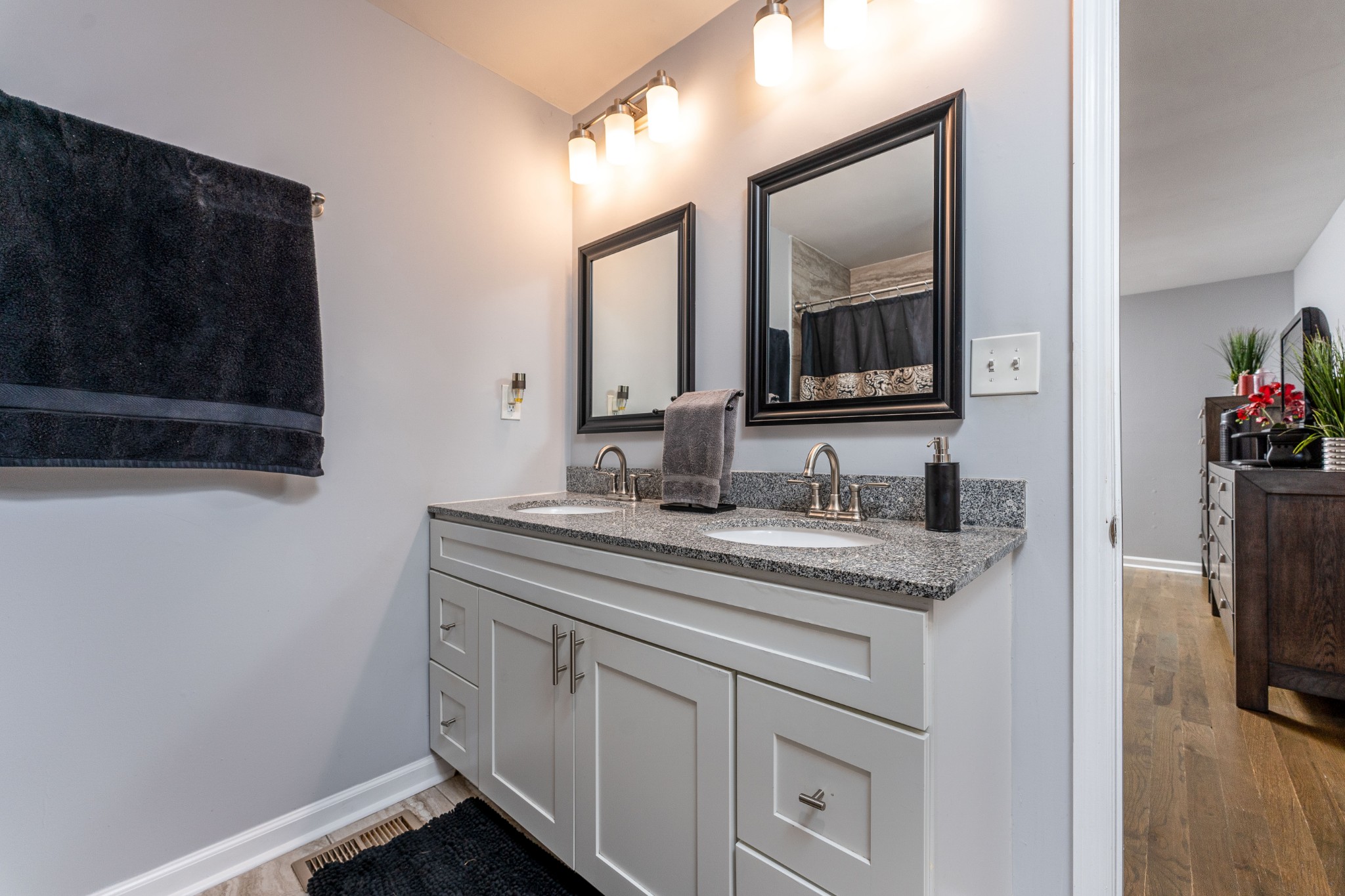 710 High Point Ridge Road Franklin, TN 37069 - Photo 16 of 32 a bathroom with a granite countertop sink and a mirror