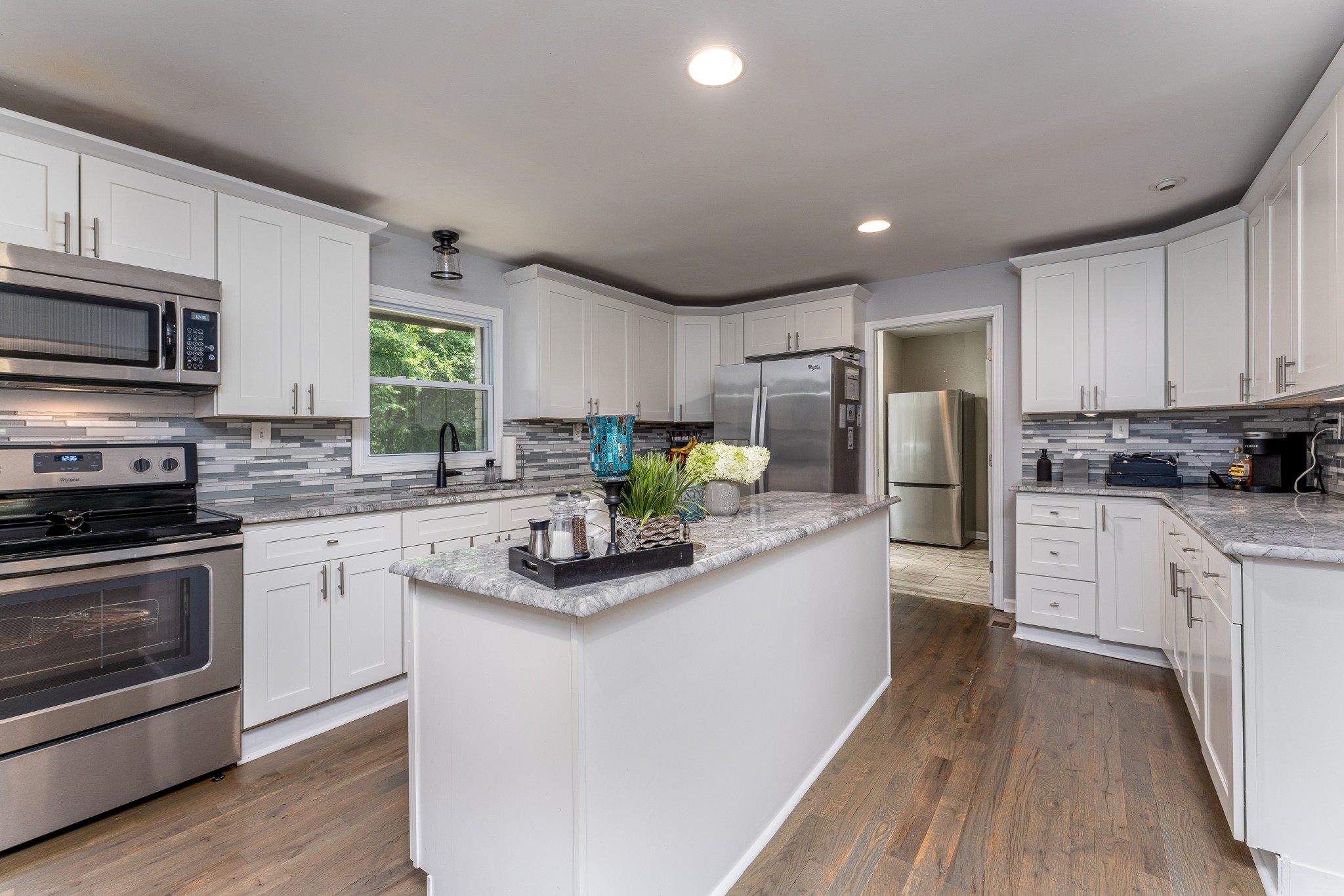 710 High Point Ridge Road Franklin, TN 37069 - Photo 18 of 32 a kitchen with refrigerator and cabinets
