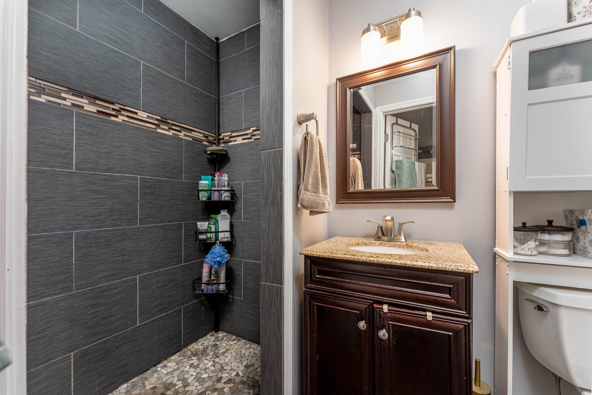 710 High Point Ridge Road Franklin, TN 37069 - Photo 23 of 32 a bathroom with a sink and a mirror