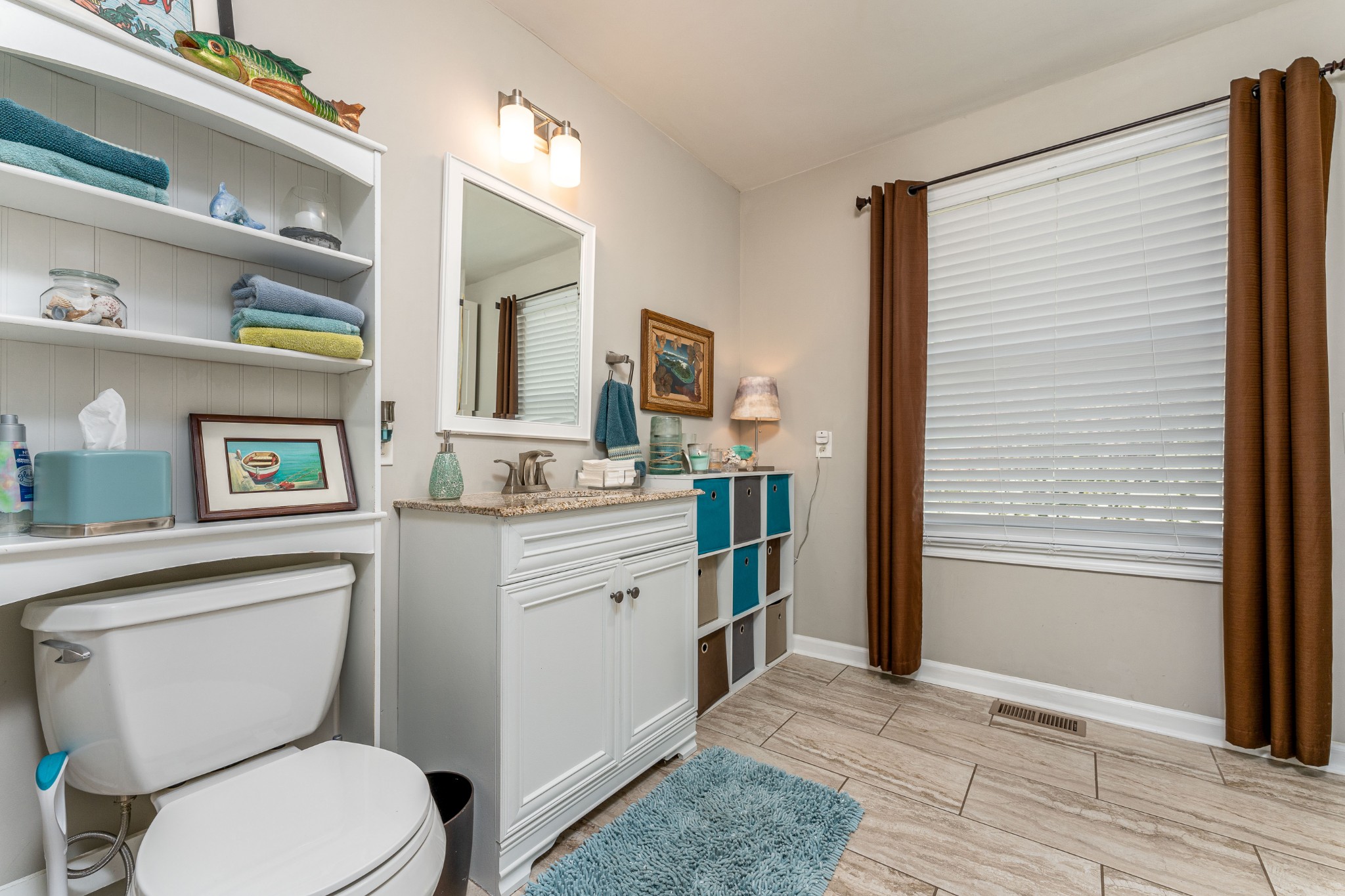 710 High Point Ridge Road Franklin, TN 37069 - Photo 25 of 32 a bathroom with a toilet sink and mirror