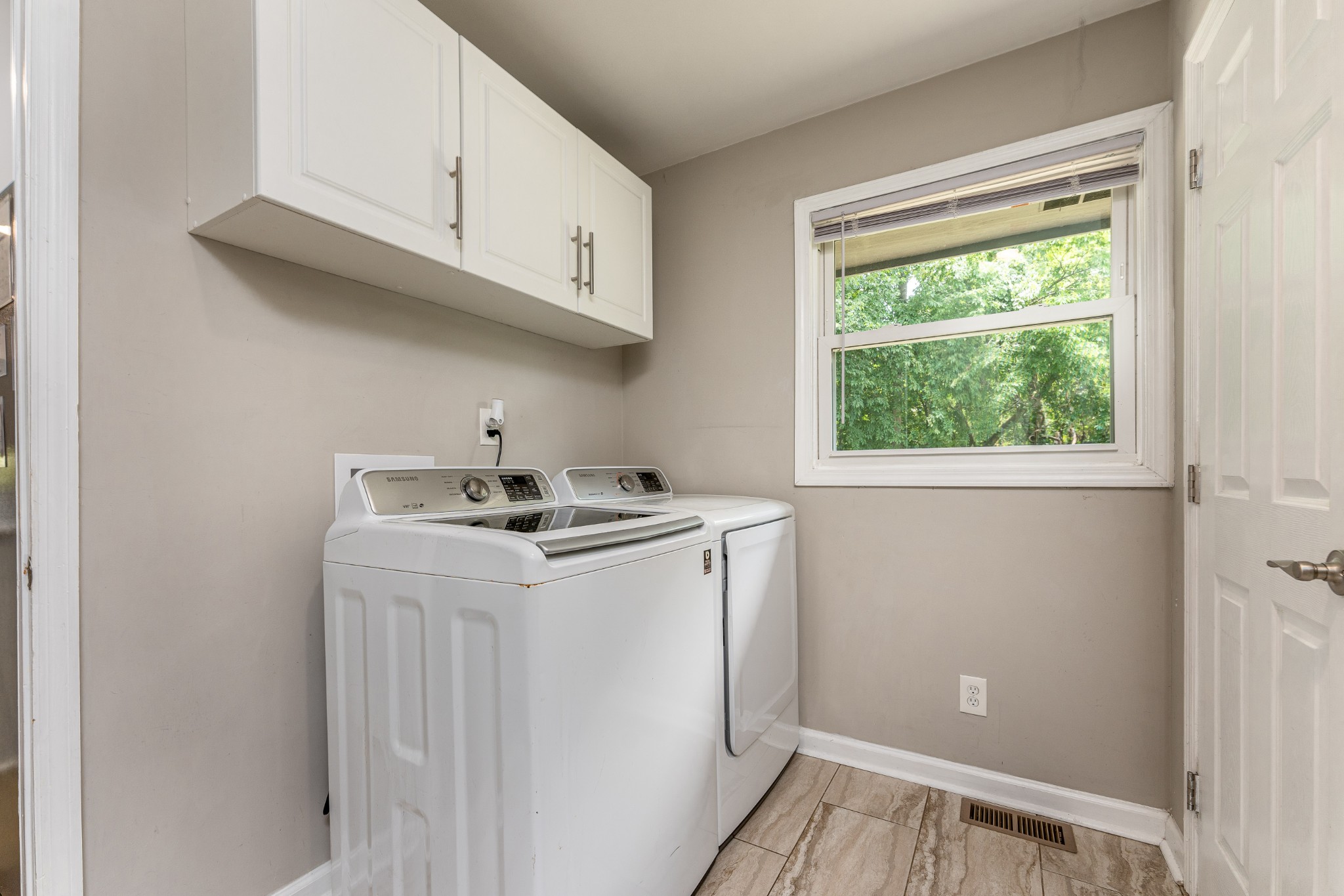 710 High Point Ridge Road Franklin, TN 37069 - Photo 27 of 32 a utility room with sink washer and dryer