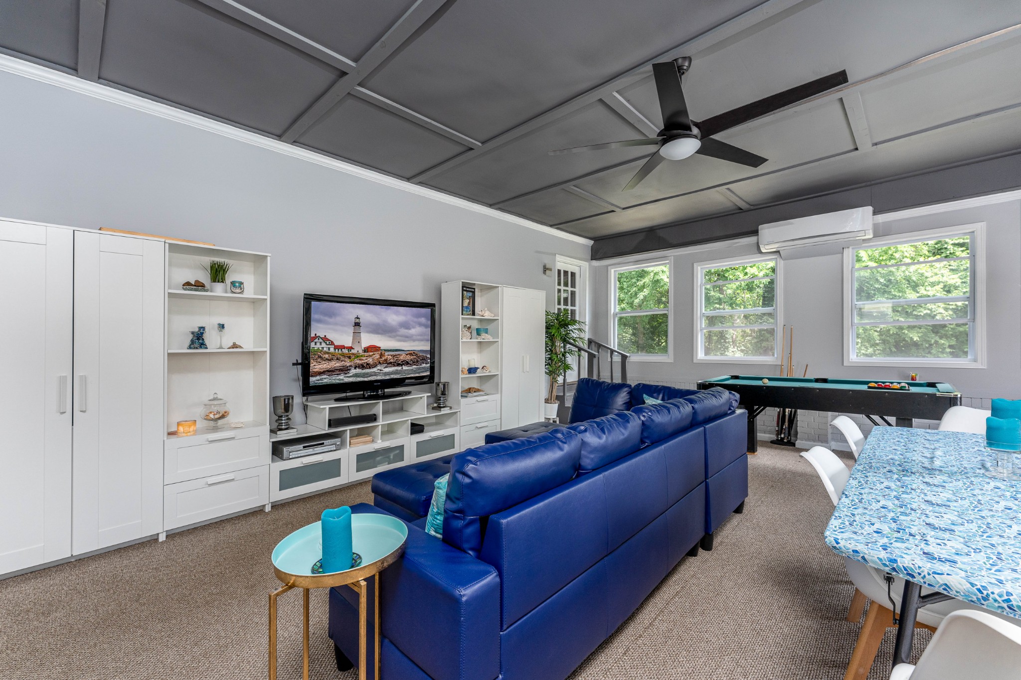 710 High Point Ridge Road Franklin, TN 37069 - Photo 32 of 32 a living room with furniture and a flat screen tv