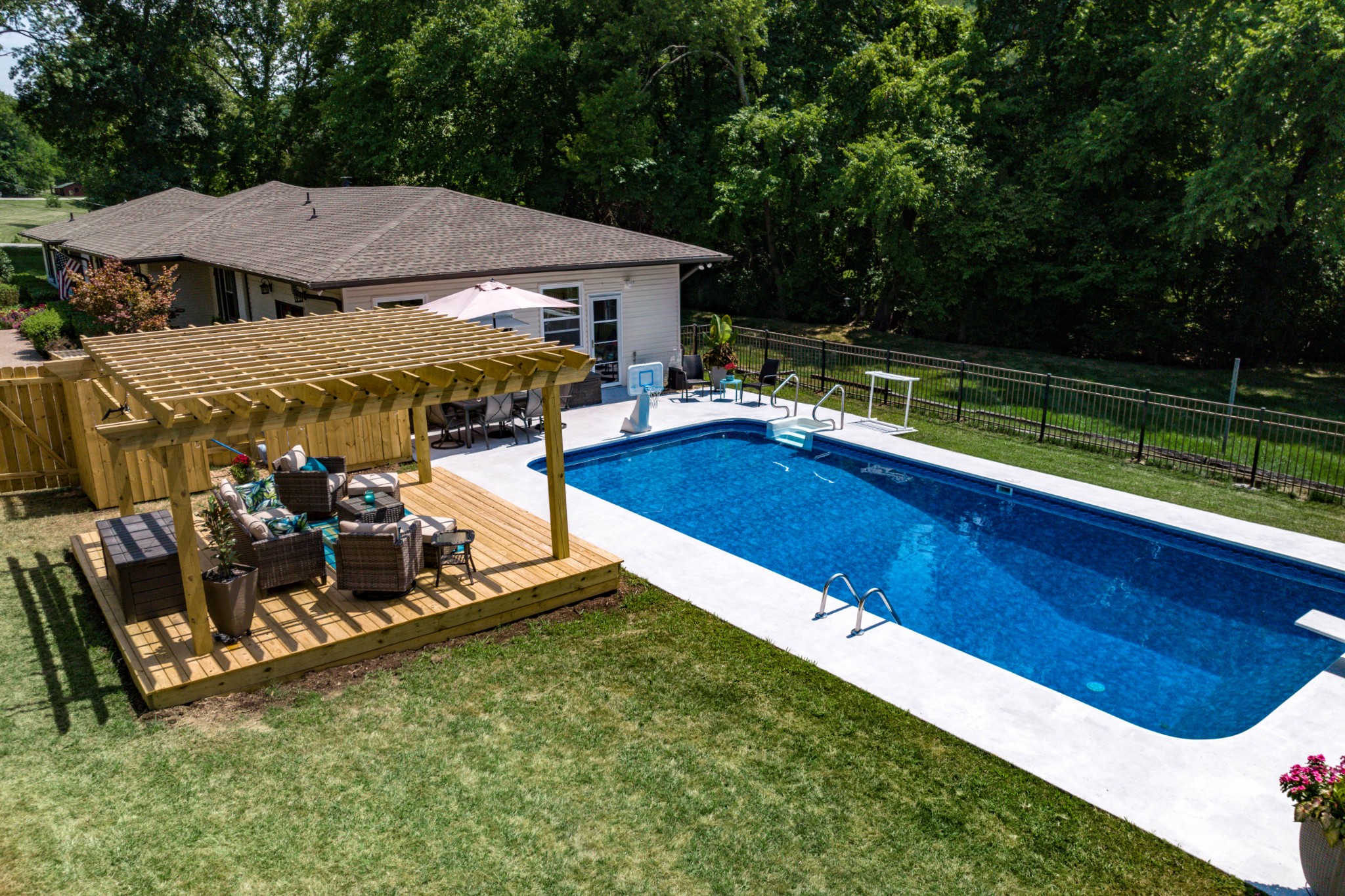 710 High Point Ridge Road Franklin, TN 37069 - Photo 6 of 32 a view of swimming pool with lawn chairs and plants