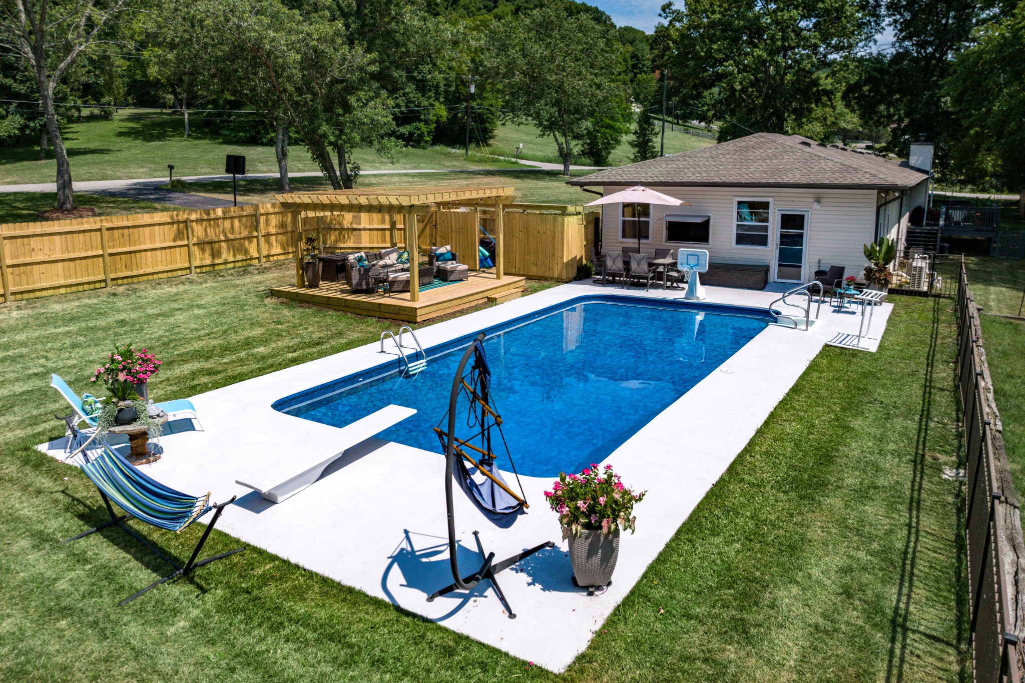 710 High Point Ridge Road Franklin, TN 37069 - Photo 7 of 32 a view of a swimming pool with a patio