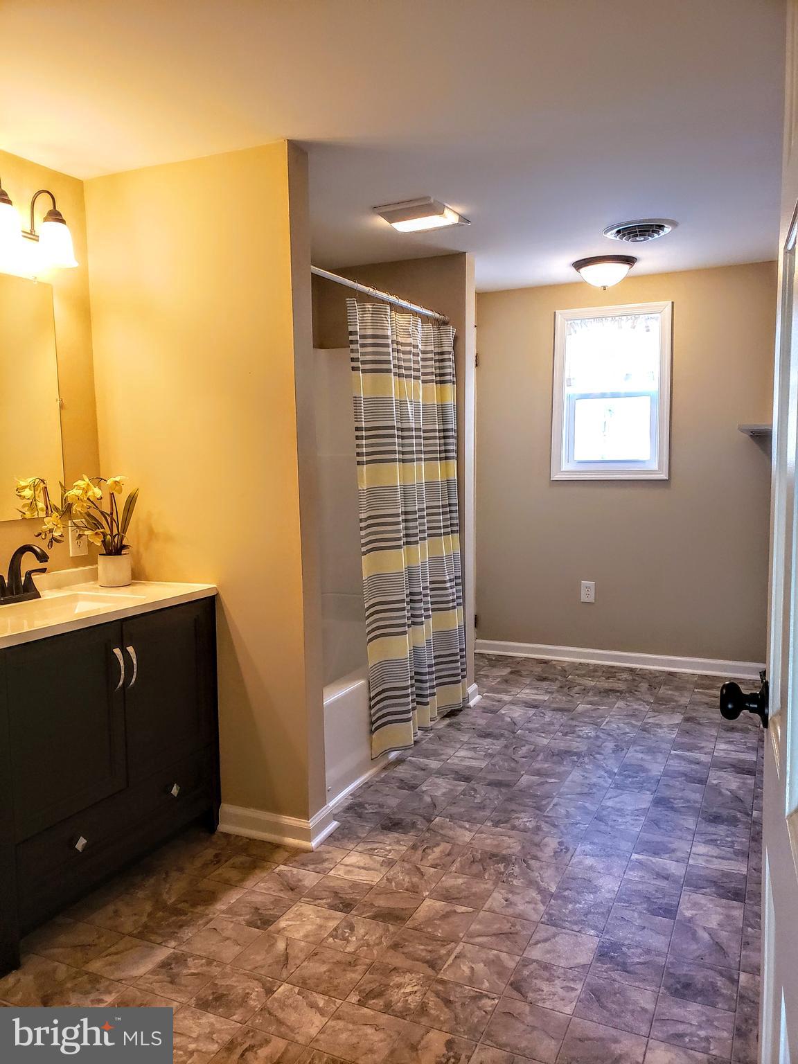 3268 Steltz Road New Freedom, PA 17349 - Photo 27 of 37 Large bathroom with washer/dryer hookup