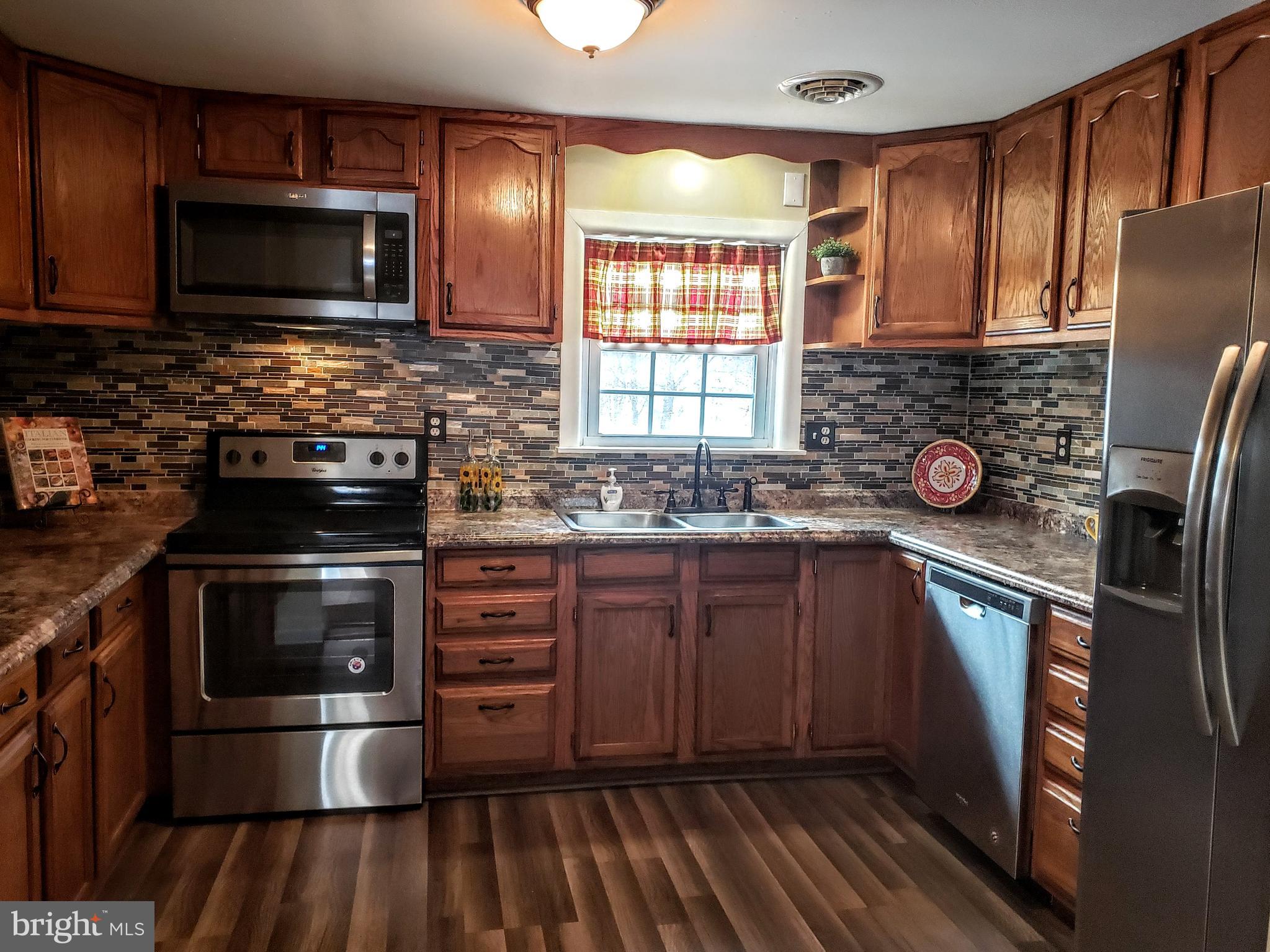 3268 Steltz Road New Freedom, PA 17349 - Photo 10 of 37 Kitchen - New counters, backsplash, SS appiances