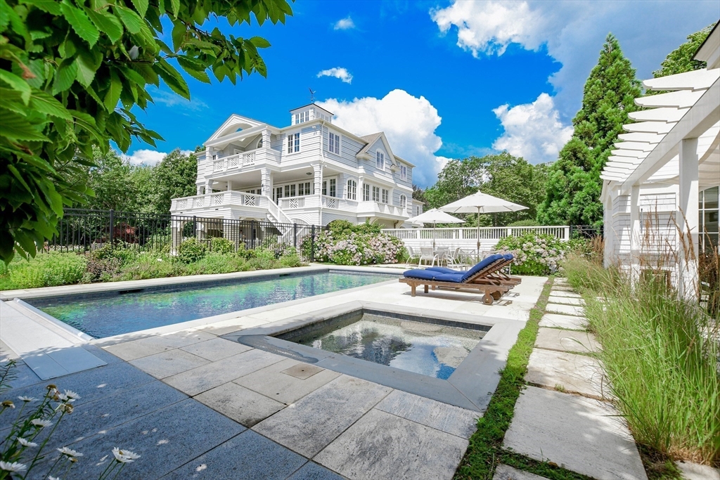 85 Moorings Road Marion, MA 02738 - Photo 7 of 41 a view of a swimming pool with a patio