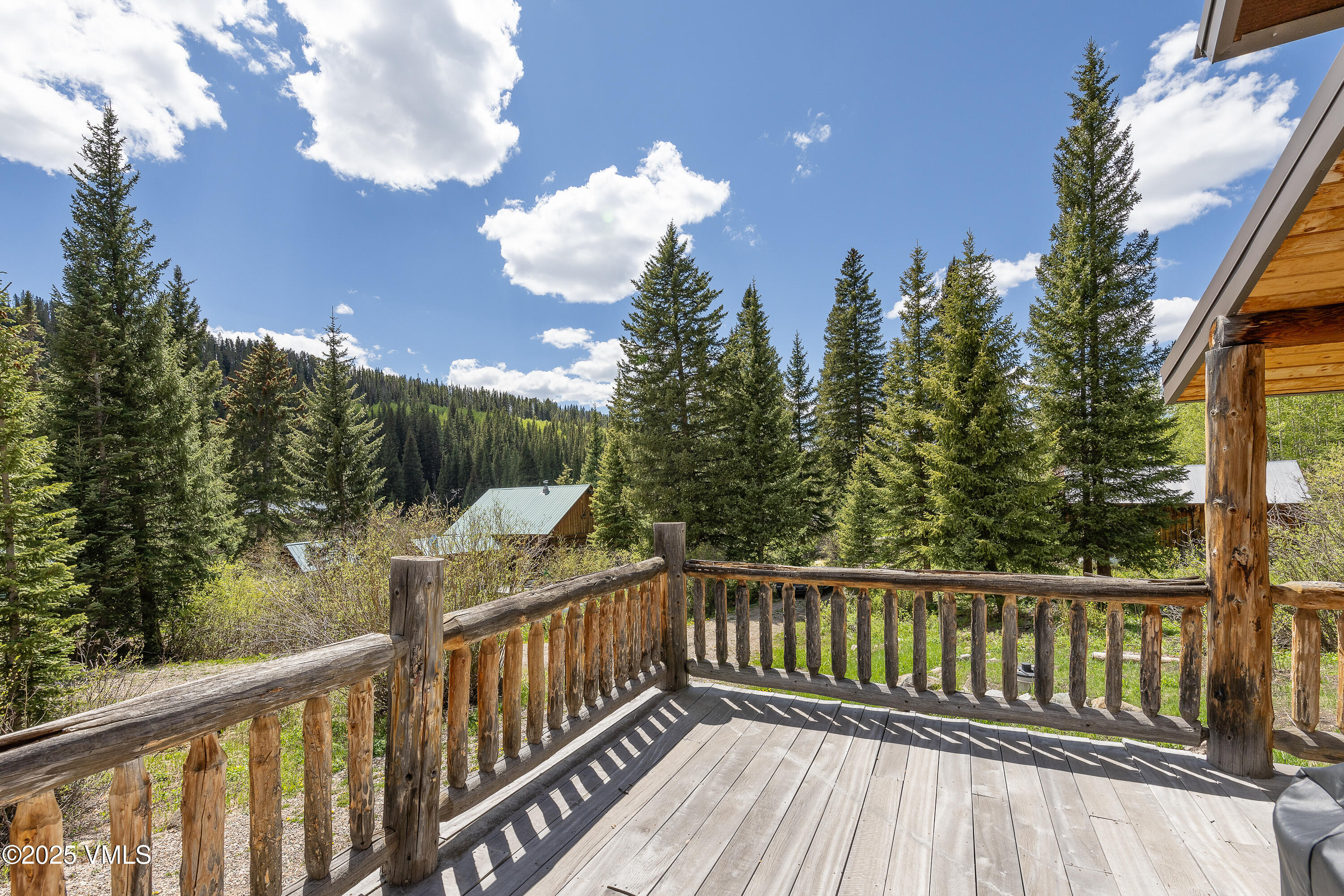 320 Mill Eagle Co 81631 Eagle, CO 81631 - Photo 12 of 33 a view of a balcony with wooden fence