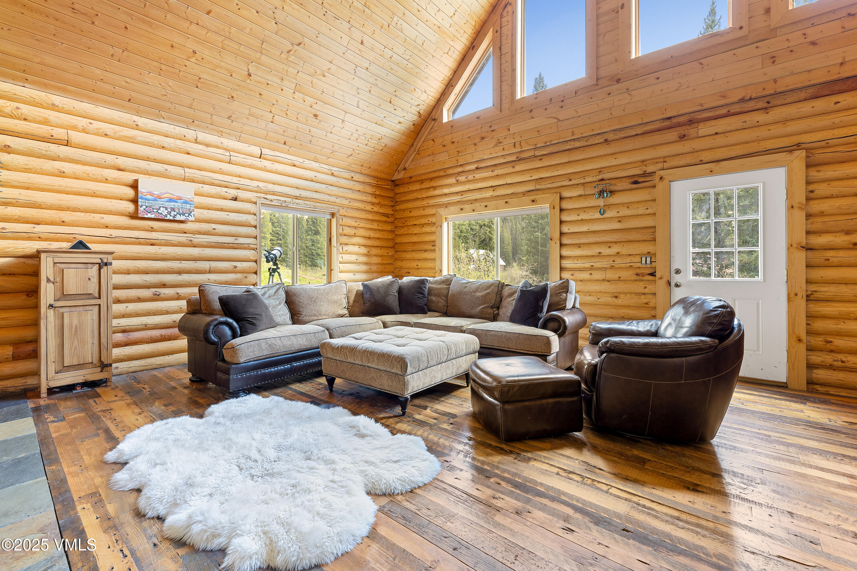 320 Mill Eagle Co 81631 Eagle, CO 81631 - Photo 15 of 33 a outdoor living space with furniture and wooden floor