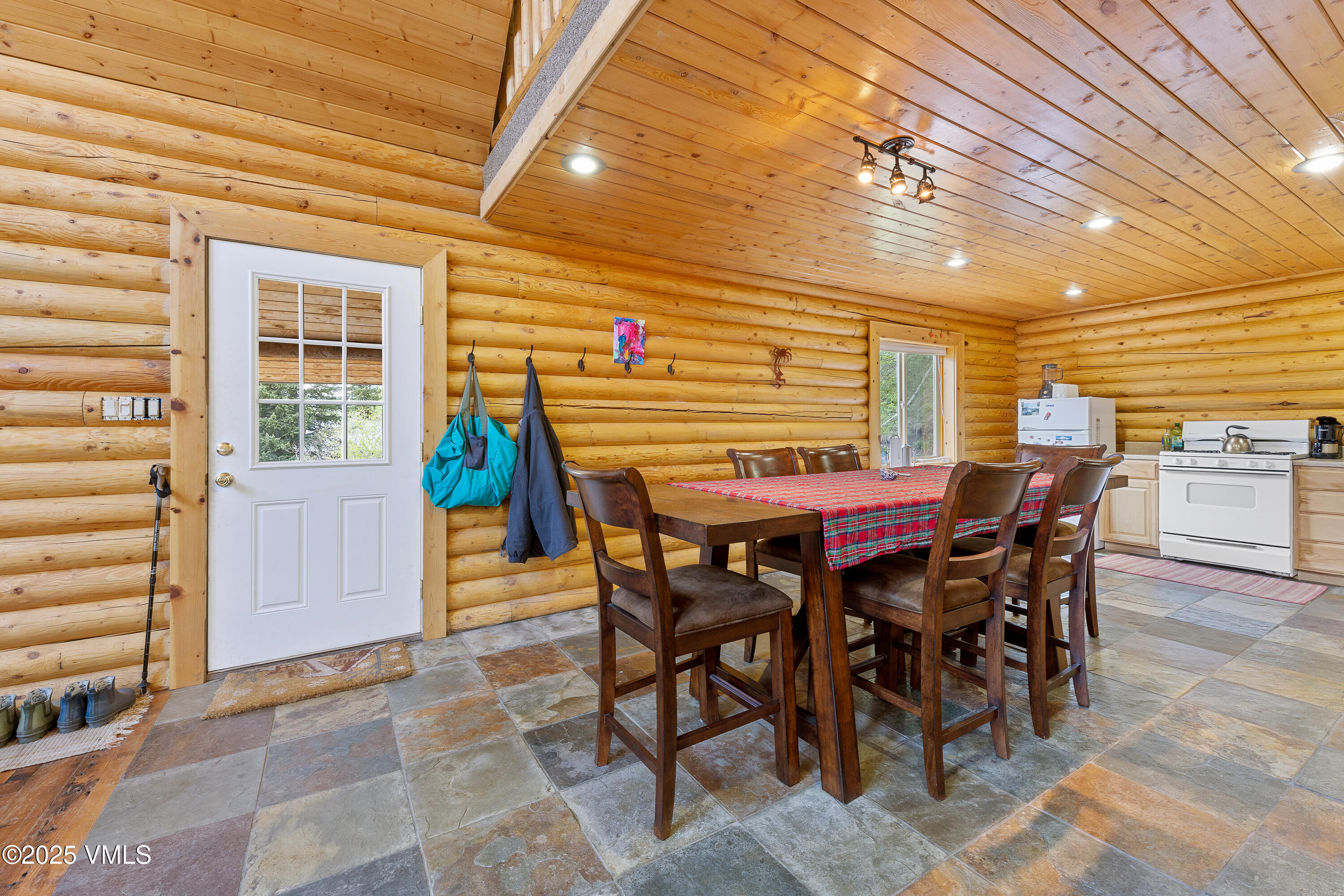 320 Mill Eagle Co 81631 Eagle, CO 81631 - Photo 20 of 33 a view of a dining room with furniture and window