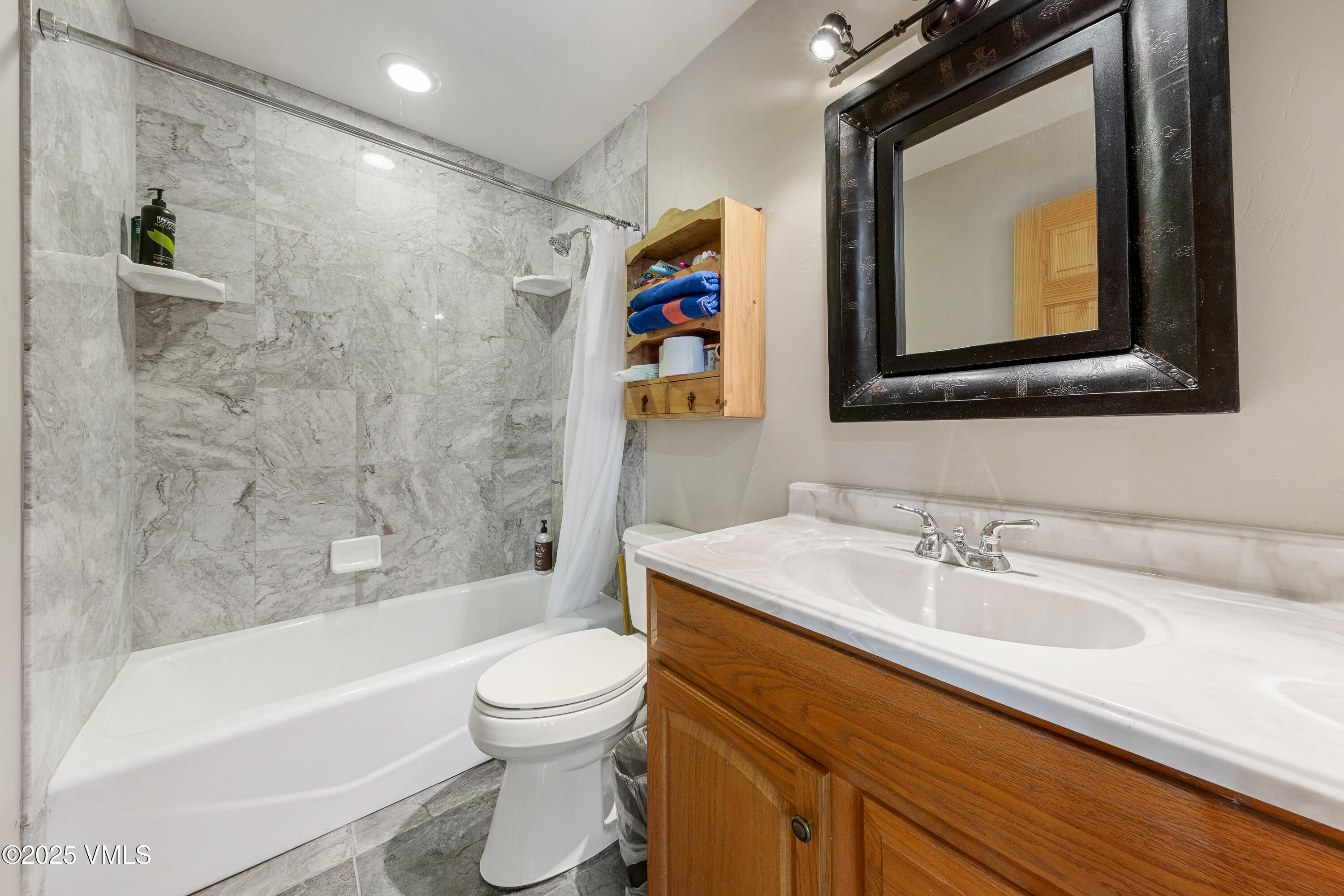 320 Mill Eagle Co 81631 Eagle, CO 81631 - Photo 23 of 33 a bathroom with a sink a toilet and a bathtub