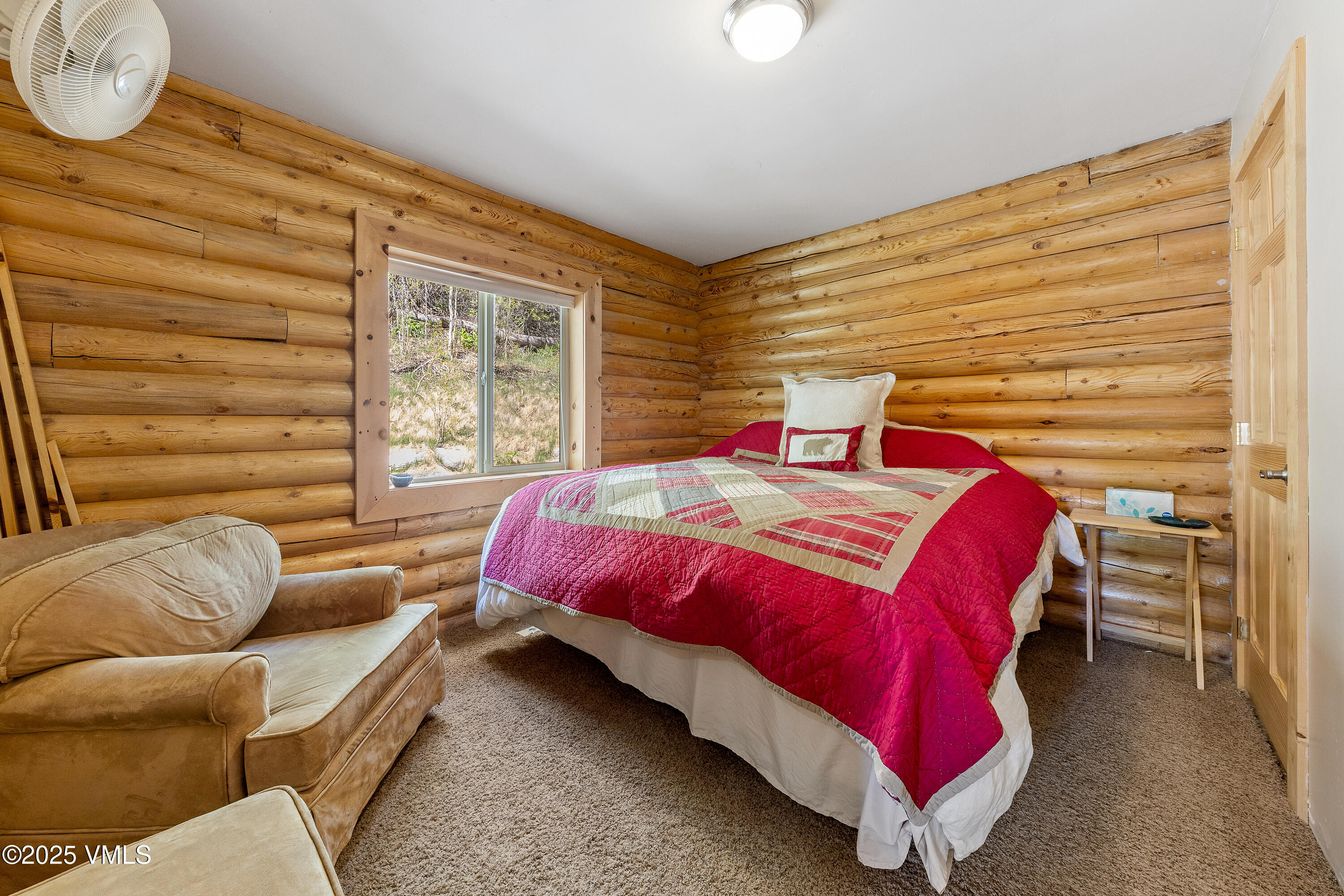 320 Mill Eagle Co 81631 Eagle, CO 81631 - Photo 24 of 33 a bedroom with a bed couch and window