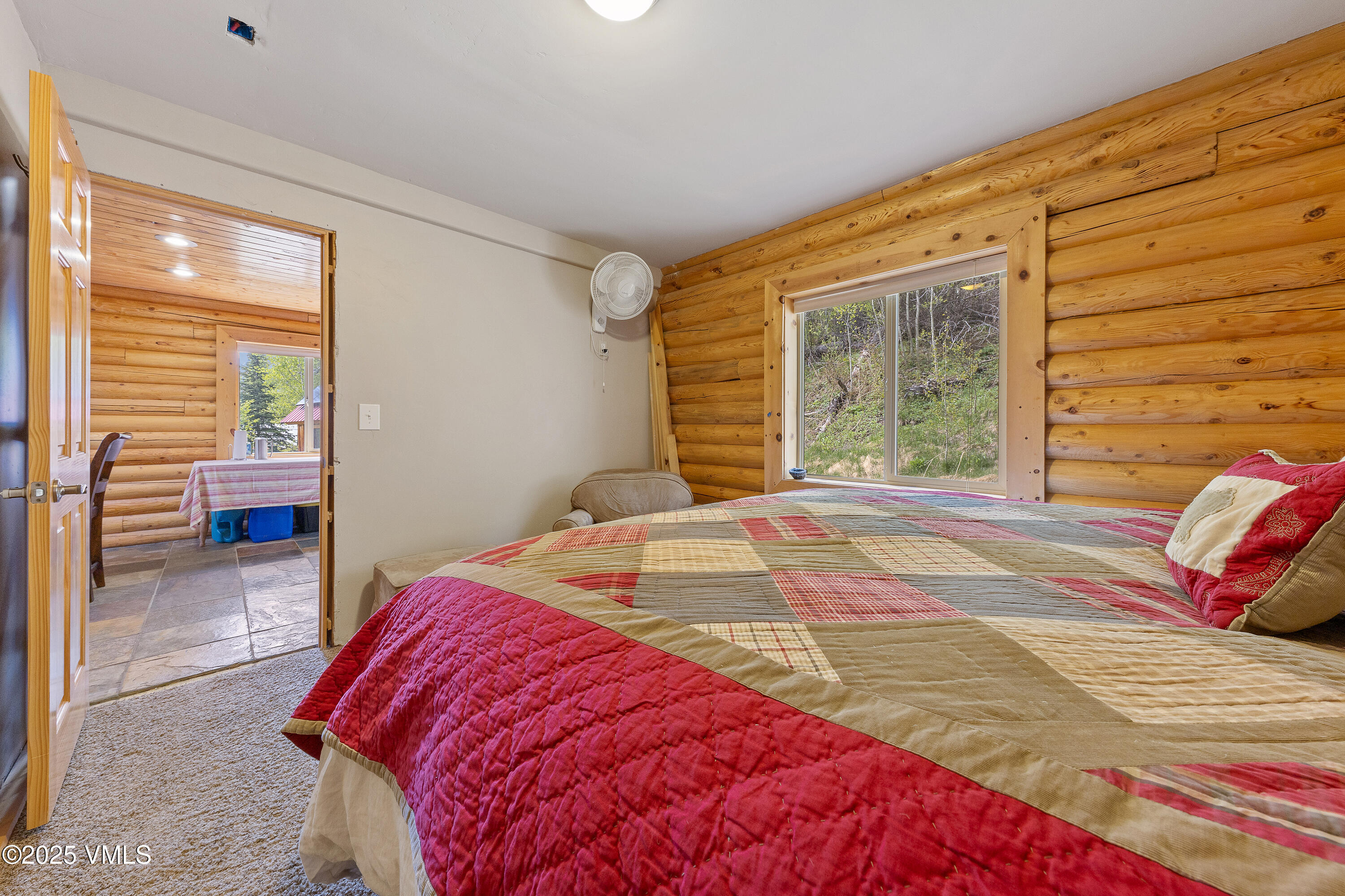 320 Mill Eagle Co 81631 Eagle, CO 81631 - Photo 25 of 33 a bedroom with a bed and a large window